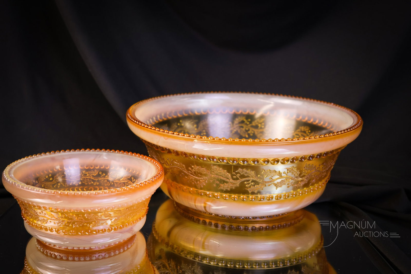 2 pc Lot Victorian Greentown Holly Amber Glass Bowls: Two excellent examples of Victorian Holly Amber glass. This lot offers a master berry bowl and an individual berry bowl. The largest measures 3 1/4" tall and 8 1/2" in diameter. SHIPPING NOTICE: If yo