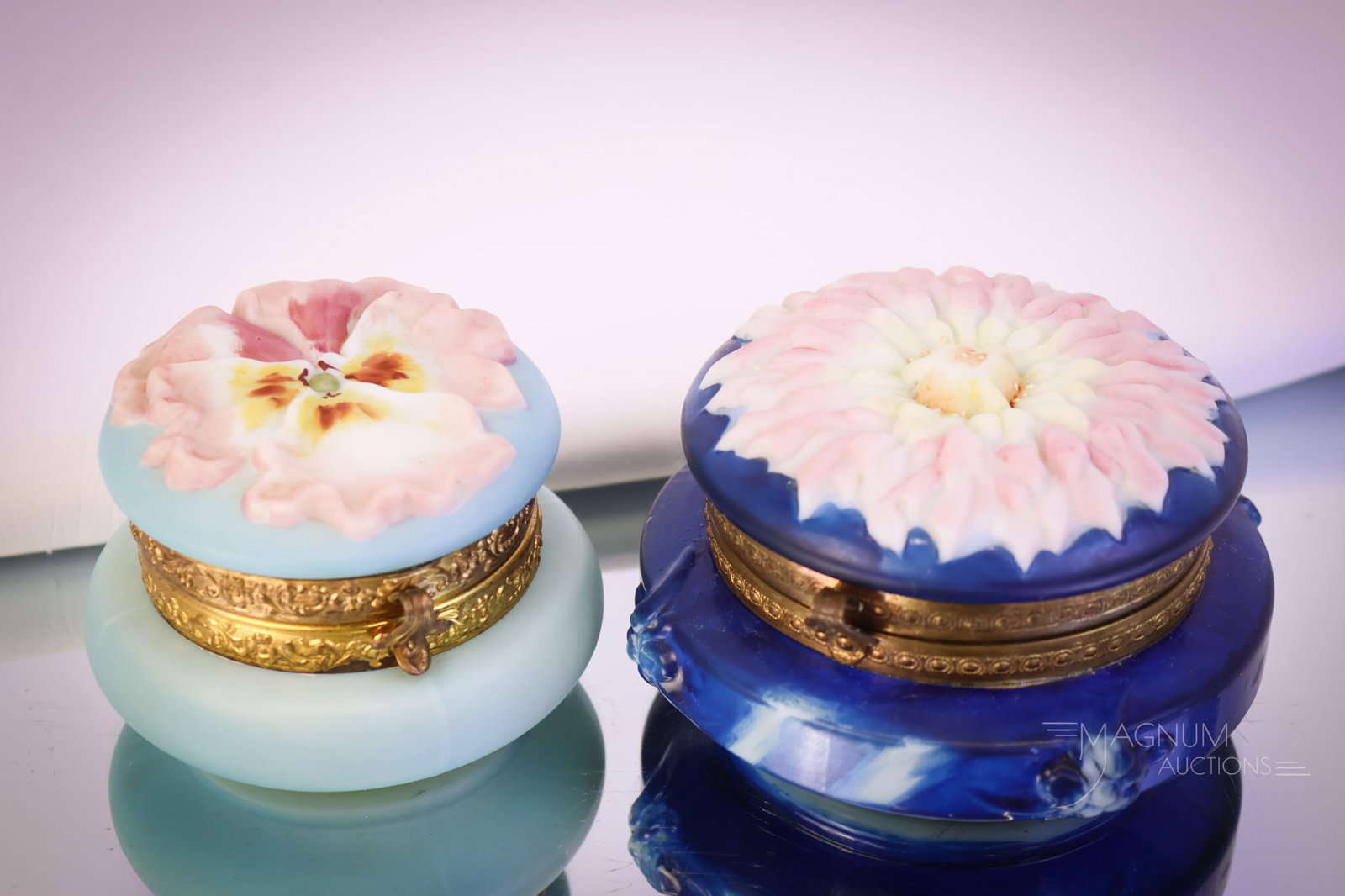 2 pc Lot Signed Wavecrest Glass Blow Out Floral Jewelry Boxes: Two lovely finds that are sure to be treasured. Both are Wavecrest jewelry boxes. The first is a signed Wavecrest cobalt decorated box with a Zinnia flower on the lid. The second is a baby blue colore