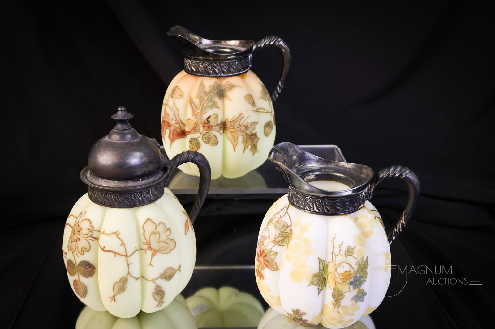 3 pc Lot Mt. Washington Crown Milano Victorian Art Glass: Three selections that are sure to please in this lot of Mt. Washington Crown Milano line glass. Two of the pieces are examples of cream pitchers. One is signed. The other is not and has oak leaf and a