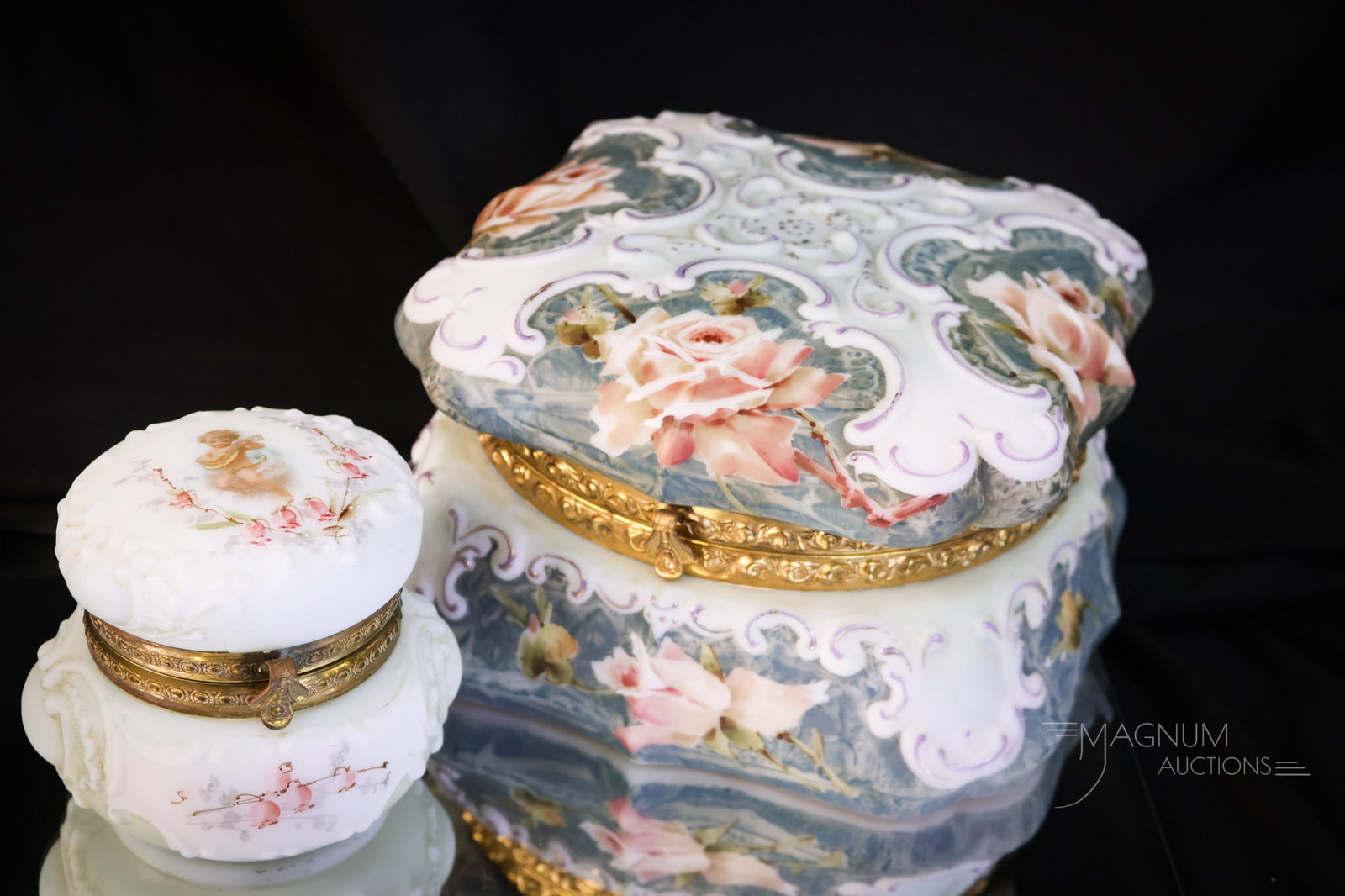 2 pc Lot Wave Crest Victorian Glass Jewelry Dresser Boxes: Two select examples of Victorian Wave Crest dresser and jewelry boxes. The first is an unsigned example in the St. Andrews Cross design. This one is in blue with pink roses and is lined. The second is