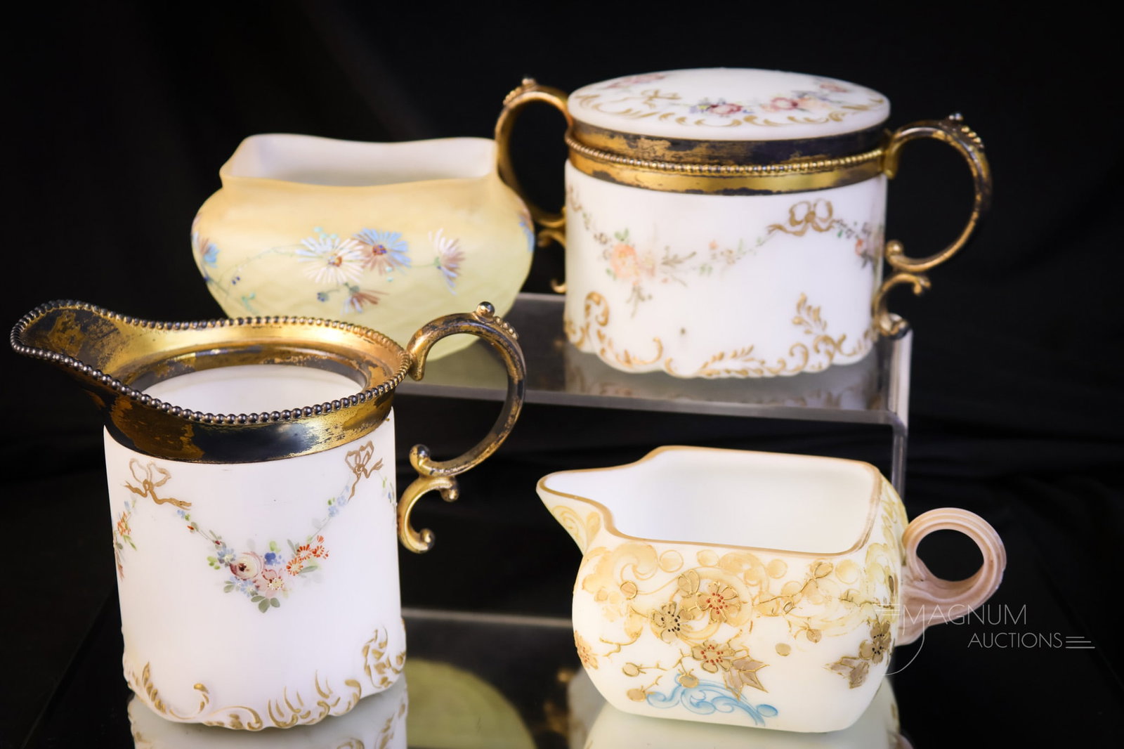 4 pc Lot Victorian Pairpoint & Mt. Washington Crown Milano Glass: Four fun finds in Victorian decorated art glass. The first pairing is a signed Pairpoint creamer and sugar with floral garland decoration. The third and fourth pieces are Mt. Washington Crown Milano i