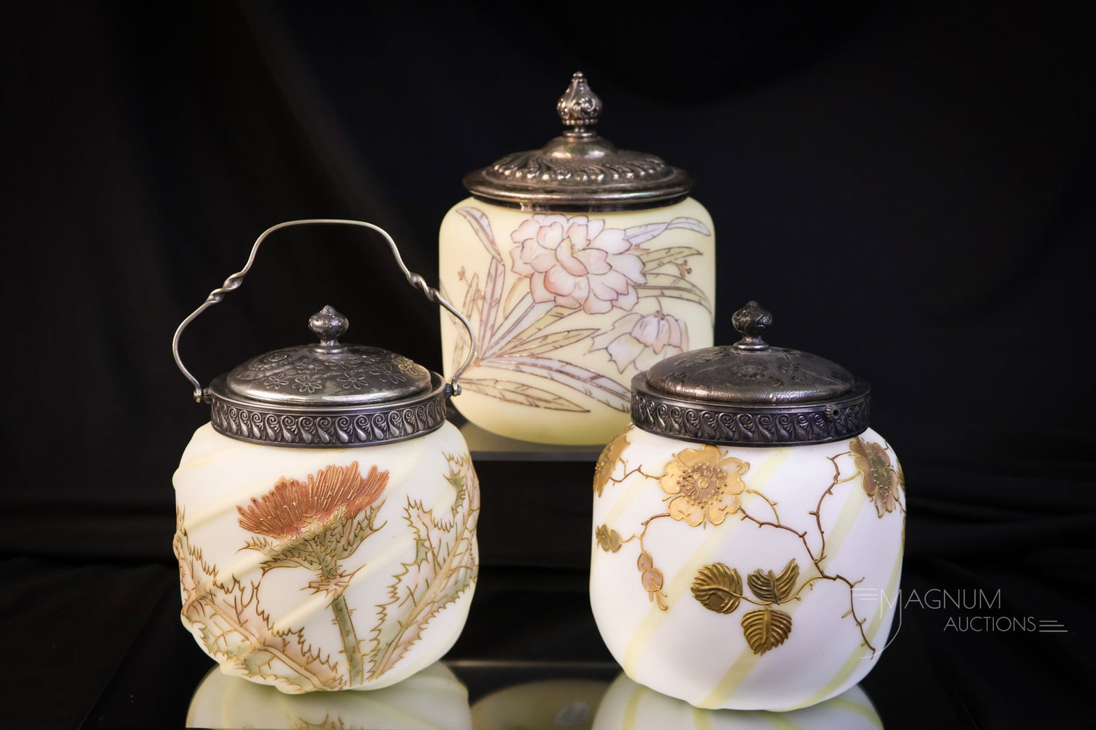 3 pc Lot Mt. Washington Victorian Glass Sweetmeat Jars Crown Milano & More: Three superb finds in Victorian Mt. Washington decorated glass sweetmeat jars. The first example is a swirl mold with thistle decoration. This is signed "M.W." on the lid. The second is a Crown Milano