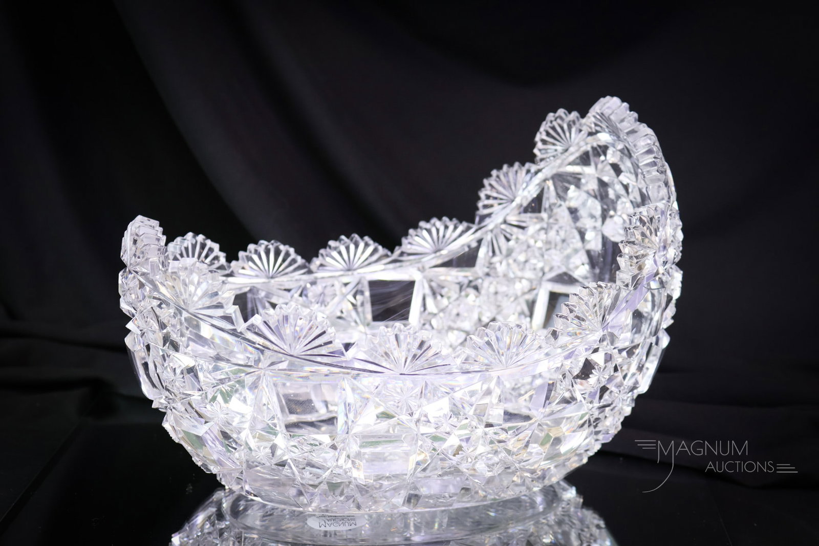 ABP Mt. Washington American Brilliant Period Cut Glass Newton Bowl: A fine example of a Mt. Washington American Brilliant Period cut glass cradle-shaped bowl in the Newton pattern. This piece measures 7" tall and 9" wide. SHIPPING NOTICE: If you choose not to utilize