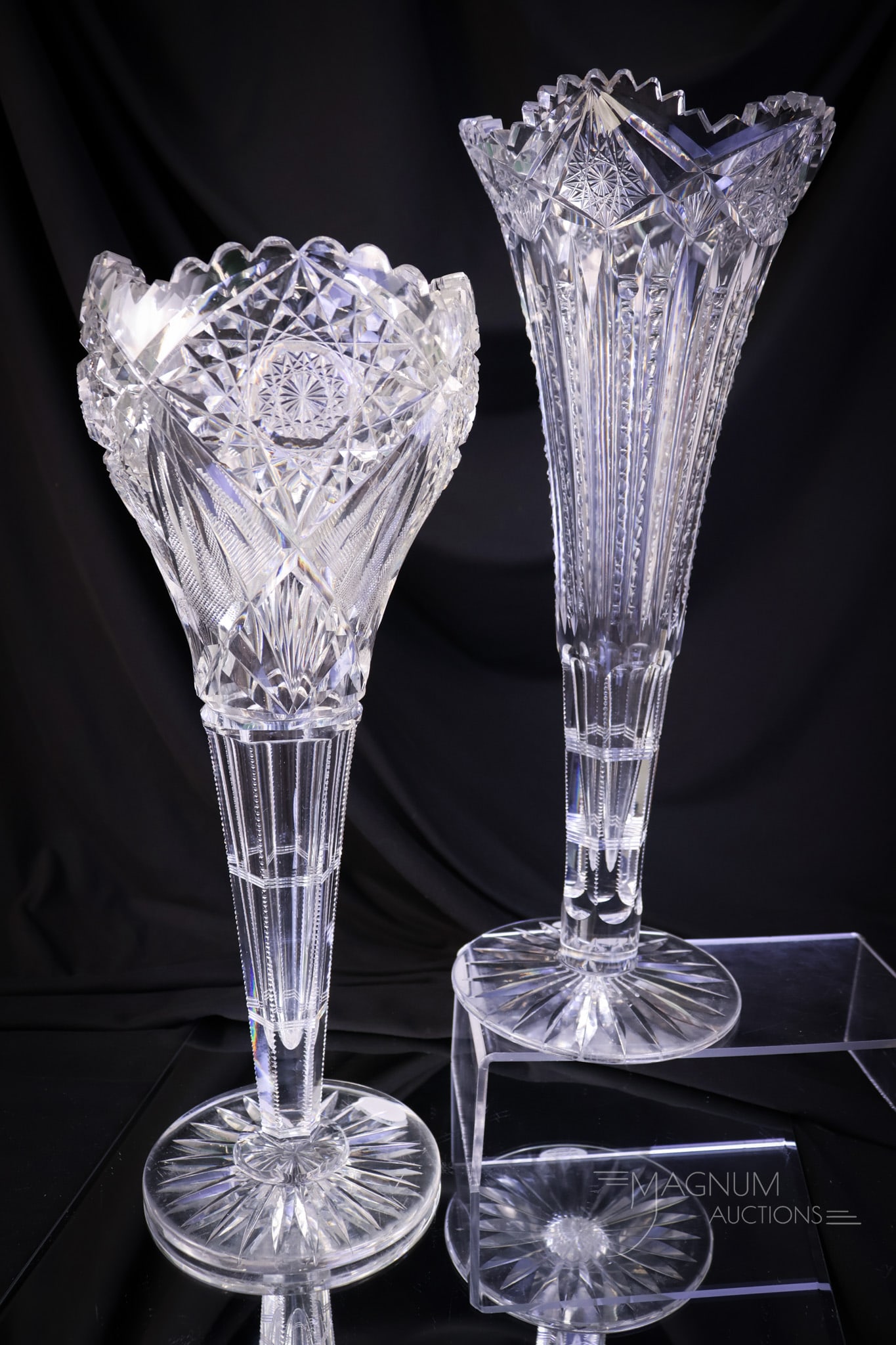2 pc Lot ABP American Brilliant Period Cut Glass Vases: Two sparkling examples of American Brilliant Period cut glass in the form of vases. The first is a chalice form. The second is a trumpet vase. The tallest measures 14". The trumpet vase exhibits a