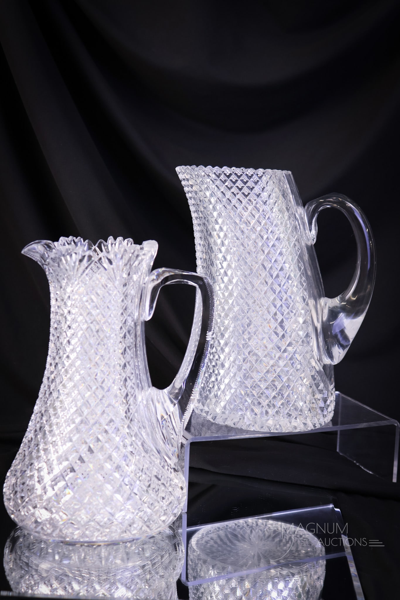2 pc Mt. Washington & More American Brilliant Period Cut Glass: Two delights in American Brilliant Period cut glass with Strawberry Diamond cutting. The first is an unusual "Leaning" pitcher attributed to Mt. Washington Glass. The second is also with the Strawberr