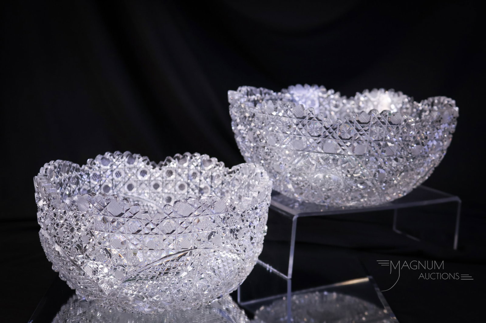 2 pc Lot ABP American Brilliant Period Cut Glass Bowls: Two sparkling examples of American Brilliant Period cut glass bowls. The largest measures 4 1/4" tall SHIPPING NOTICE: If you choose not to utilize the LiveAuctioneers LiveShip program, MAGNUM AUCTION