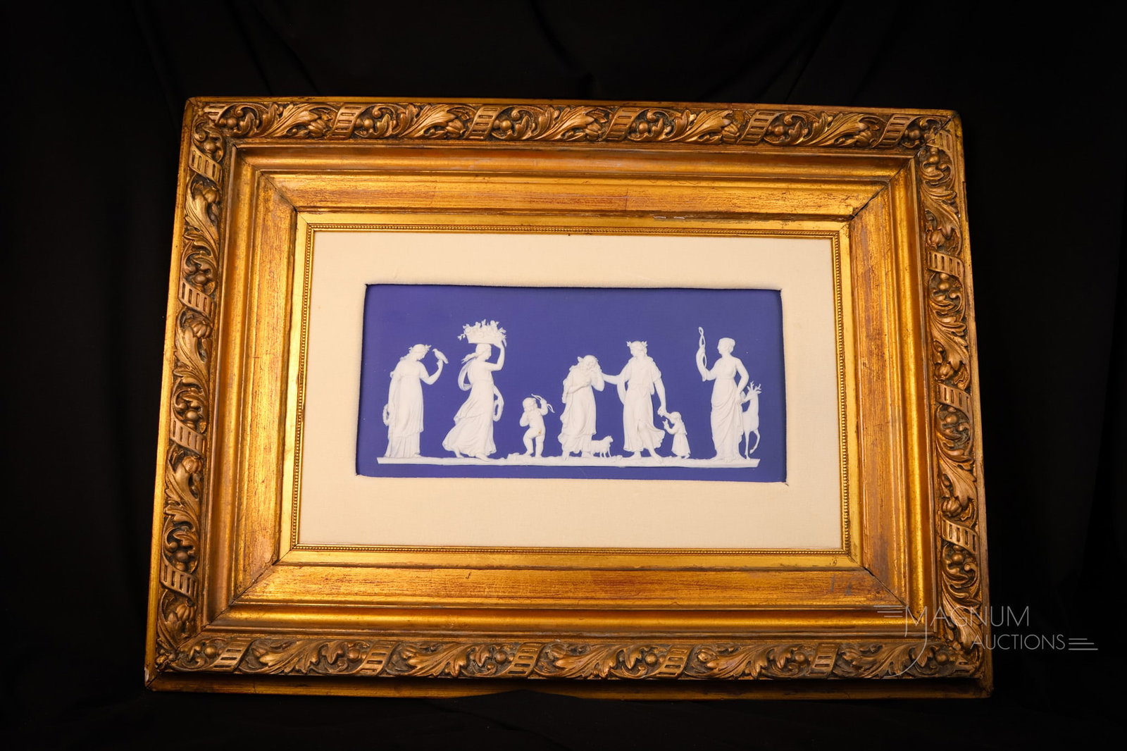 Marked Wedgwood Blue Jasperware 22 3/4" Framed Wall Plaque: A seldom-found piece, this wall plaque will surely be treasured by the new owner. This wall plaque is in marked Wedgwood blue Jasperware. The plaque itself measures 11 3/4" long and 5 1/2" tall. Frame