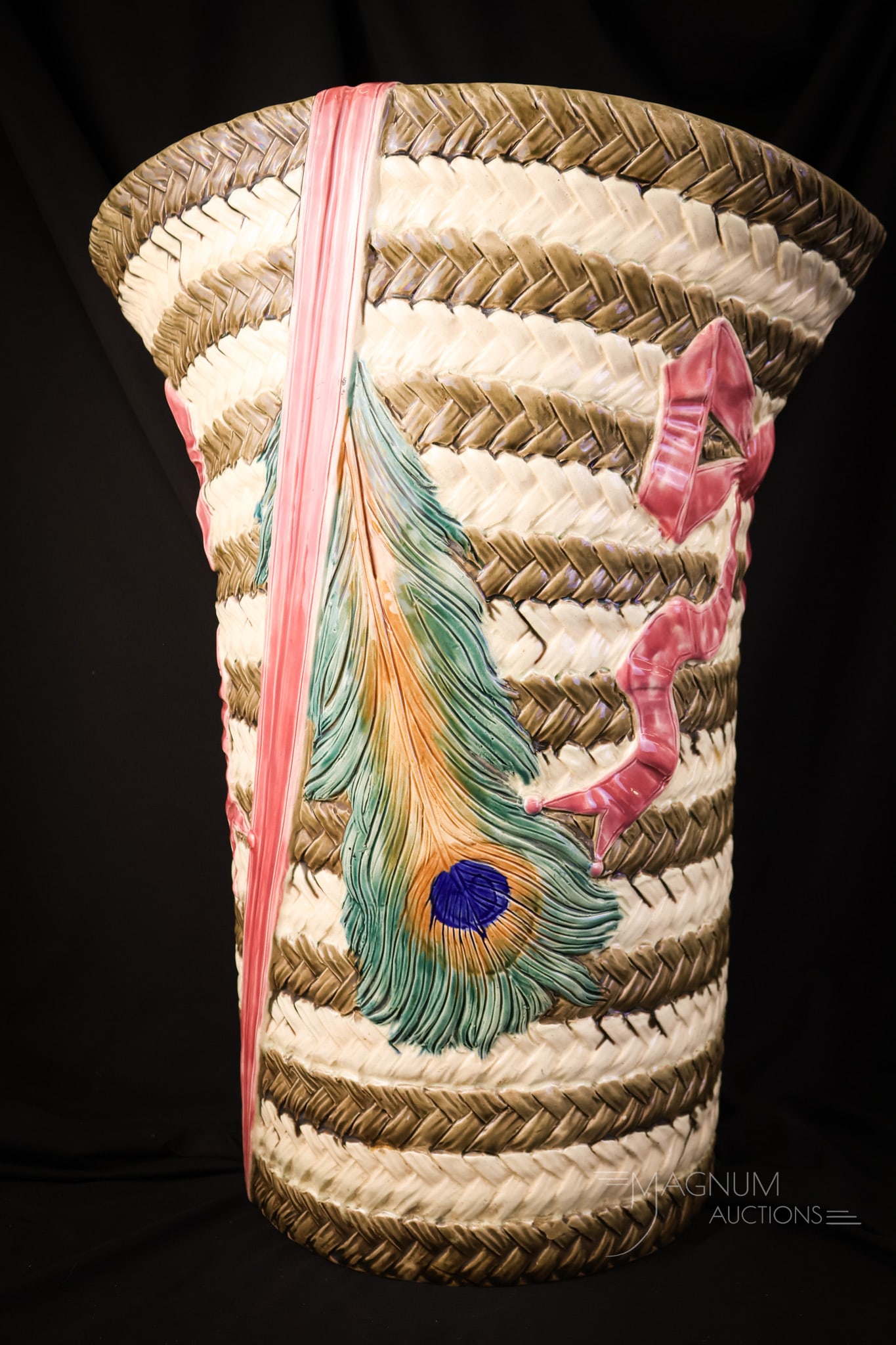 Wedwood Majolica "Peacock Feather Basket" Umbrella Stand: This piece is a Wedgwood Majolica umbrella stand from the Knowles Newport collection. The stand features a peacock feather decoration on a basket ground. The interior is a beautiful Caribbean blue. Th