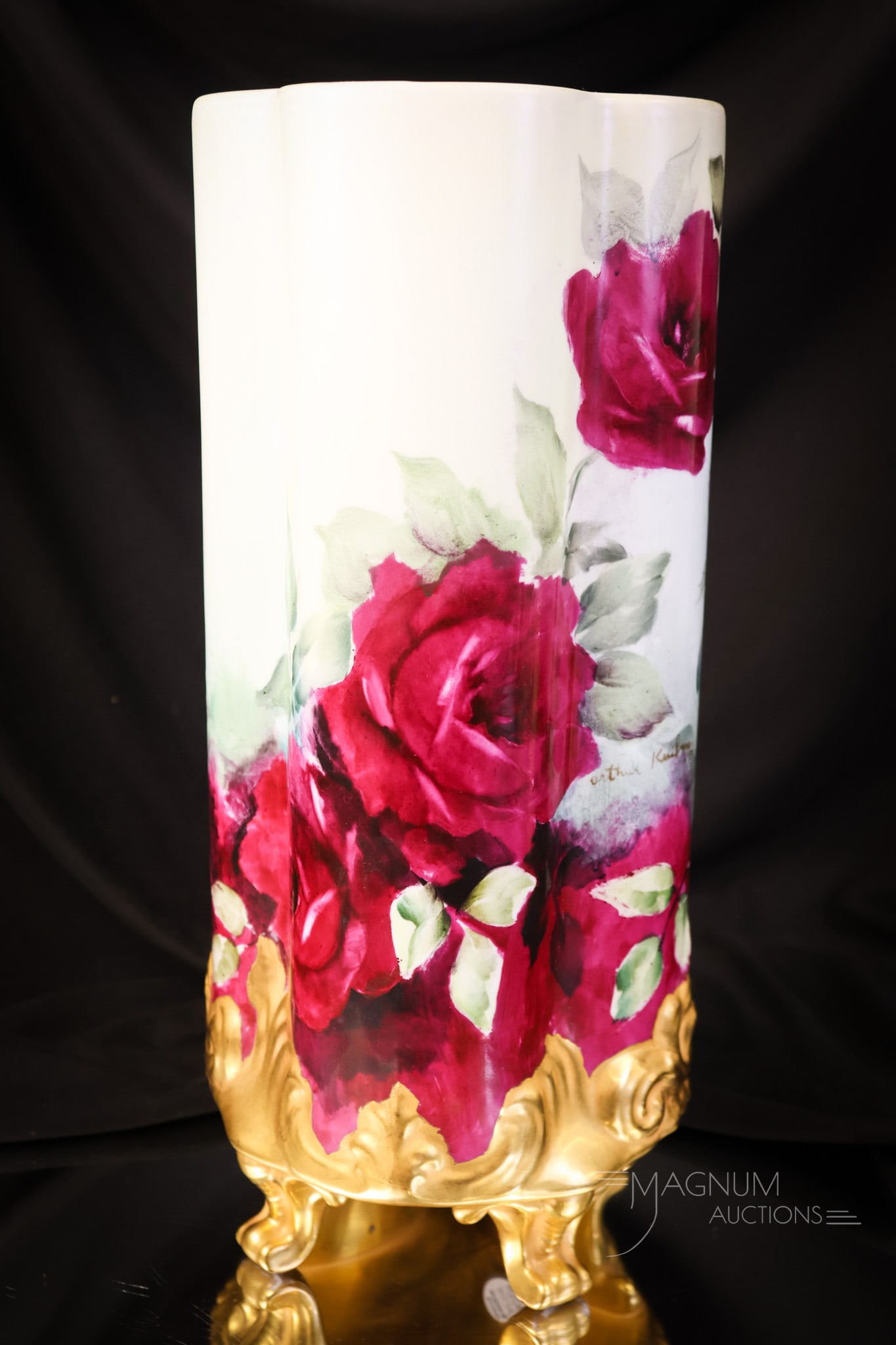 Artist Signed 12 1/2" Hand Painted Roses & Gold Footed Vase: A wonderfully ornate, unmarked Limoges hand-painted porcelain vase with crimson red roses and large amounts of gold. The vase is artist-signed by "Arthur Kushman." This vase measures 12 1/2" tall and 