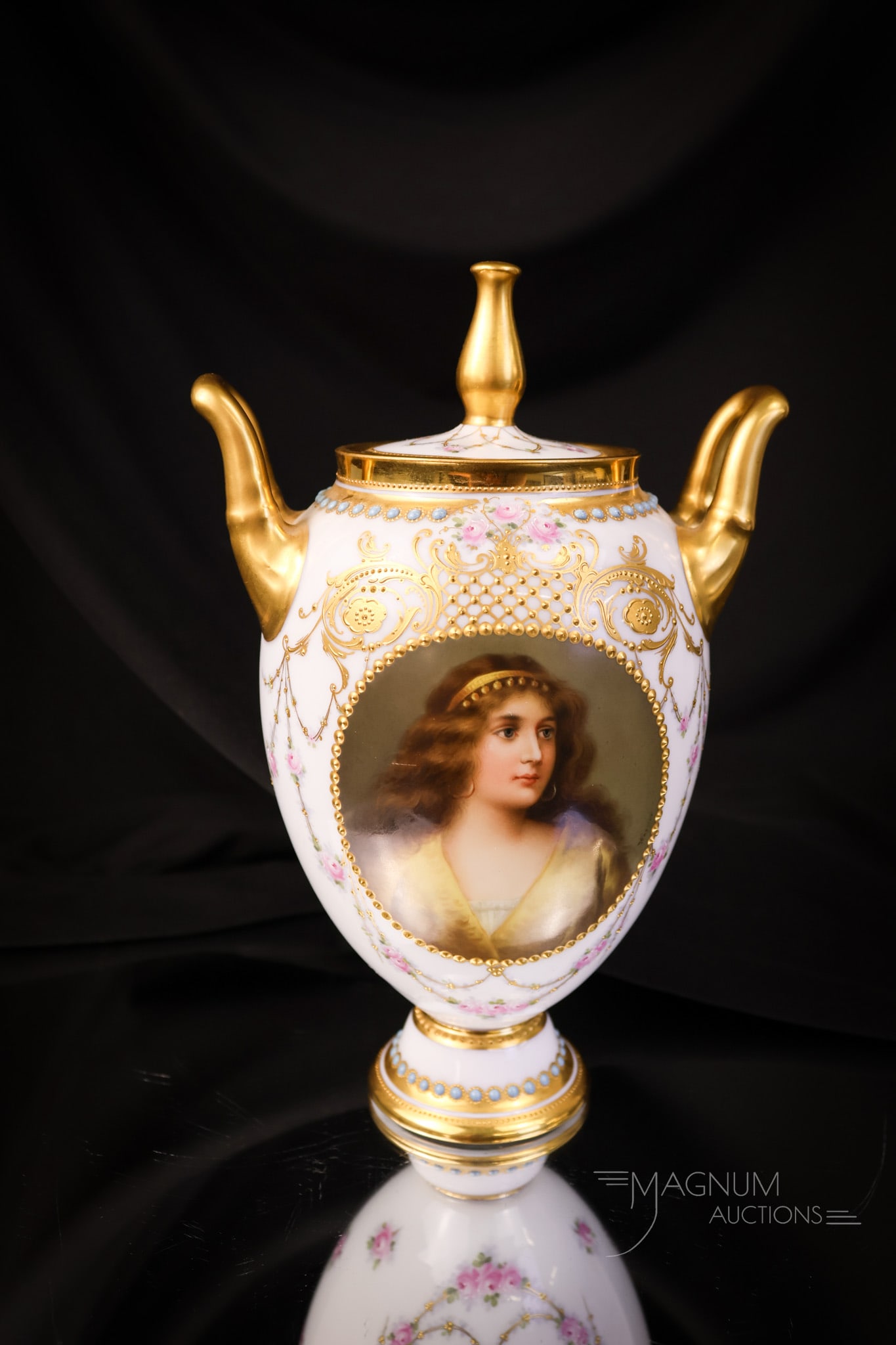 Royal Vienna Porcelain Artist Signed Wagner Portrait Urn: A very special piece of Royal Vienna in the form of a portrait urn. This piece is artist-signed by "Wagner." The urn features double handles and is exceptionally well executed with gold and blue dots.