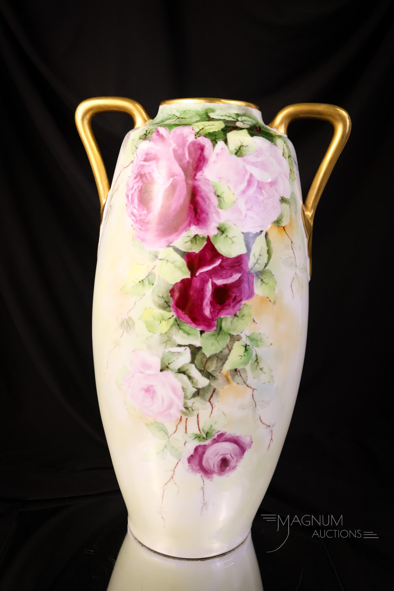 Artist Signed 16" Vienna Austria Roses Hand Painted Porcelain Vase: A beautiful artist signed, marked Vienna, Austria hand-painted porcelain vase. This vase is large at 16" tall and 9 1/4" wide. The vase features handles and is decorated with various shades of pink ro