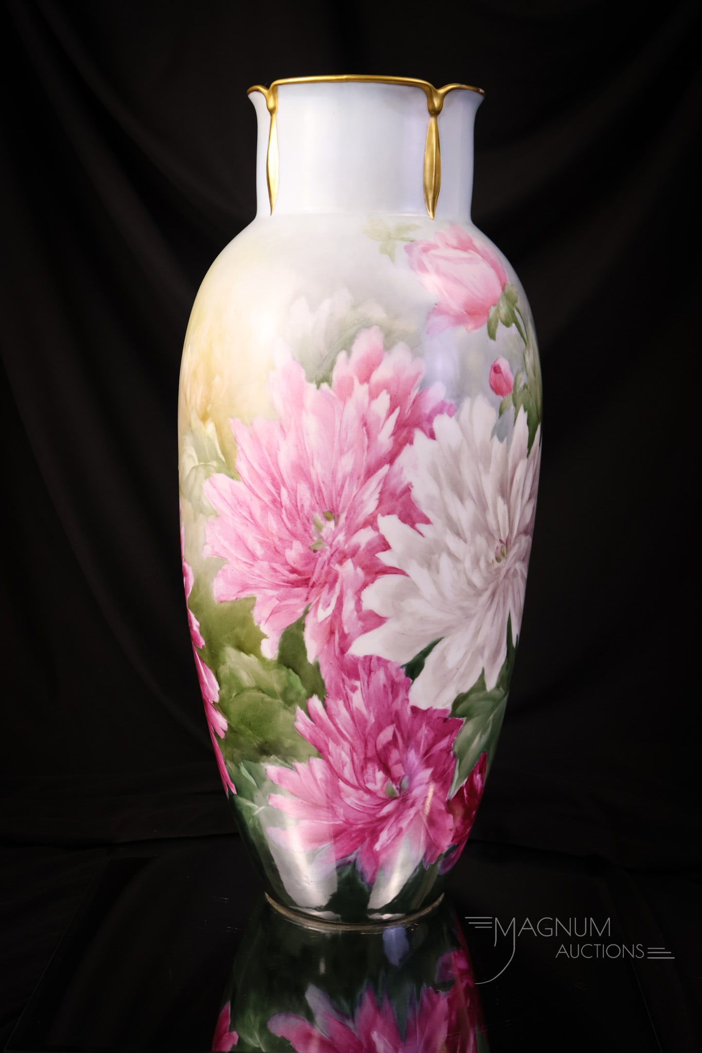 Limoges 17 1/2 Hand Painted Porcelain Peonies Gilt Vase: A striking and large 17 1/2" tall unmarked Limoges vase. This vase is decorated with white, pink, and red peony flowers. It also has gilt decoration, enhancing it. The vase is artist-signed, "E.S.M." 