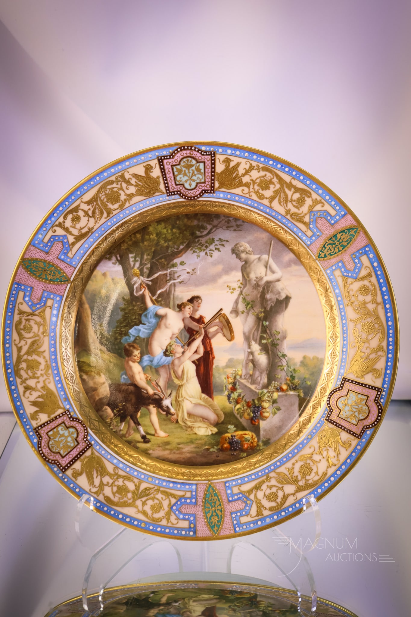 Royal Vienna Mythological Scene Plate: A wonderful Royal Vienna hand-painted ornate plate featuring a mythological scene surrounded by an ornate border of heavy gold and enamel work. The plate measures 1" tall and 9 3/4" in diameter. SHIPP