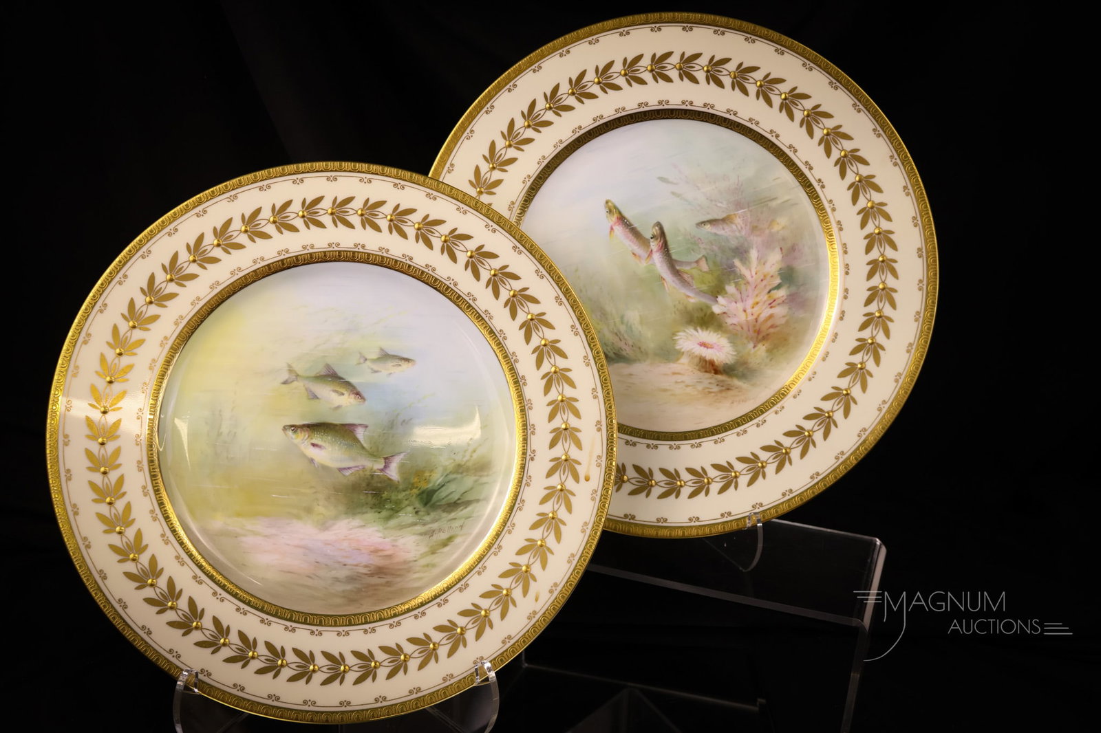 Pair of Minton hand Painted Porcelain Fish Plates: Two beautiful examples of Minton porcelain plates. Each is decorated with an underwater theme. Each is artist-signed. SHIPPING NOTICE: If you choose not to utilize the LiveAuctioneers LiveShip program