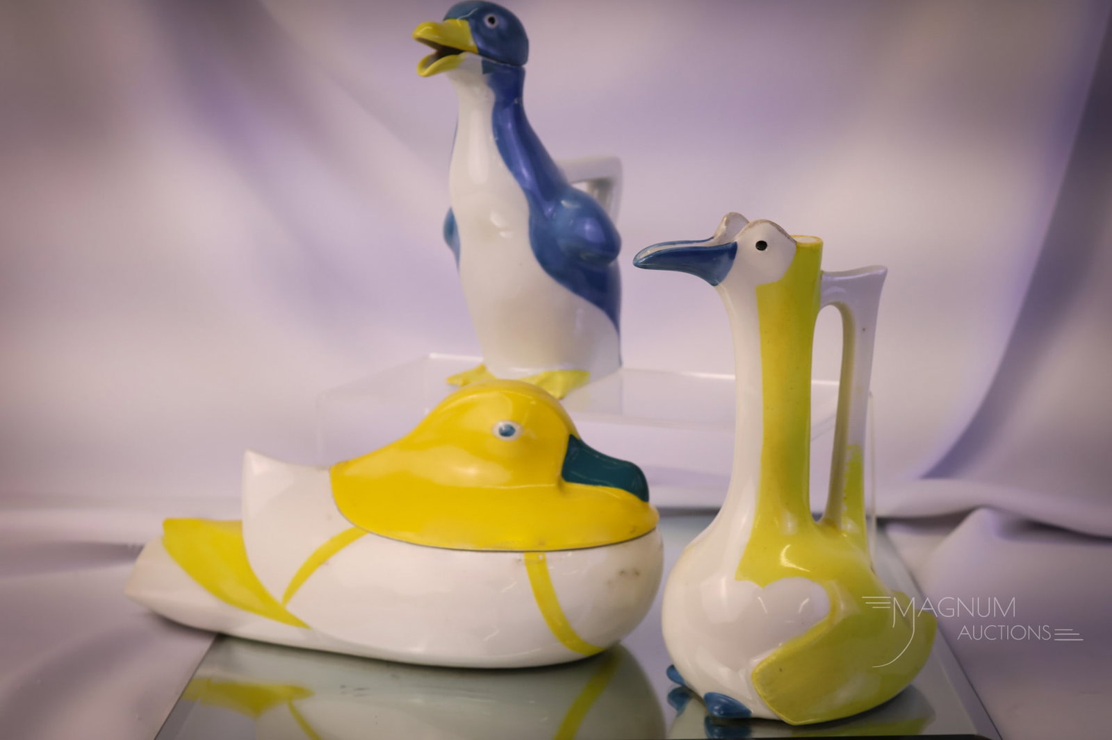 3 pc Lot Theodore Haviland Limoges Edouard Marcel Sand Oz Porcelain: Three fine pieces of Duck-themed porcelain. These three pieces are Theodore Haviland Limoges by Edouard Marcel in Sand Oz porcelain. There is a covered dish, a pitcher, and a covered pitcher. The tall