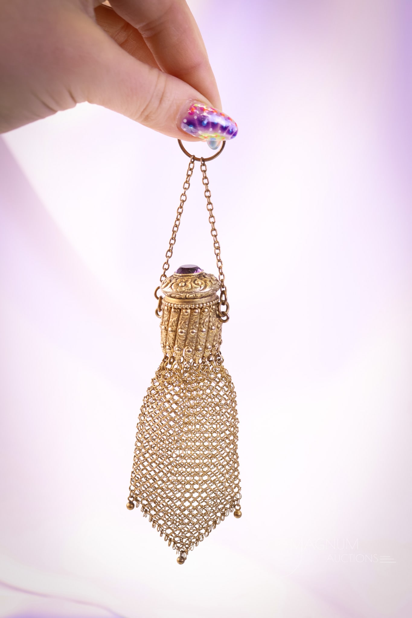 Marked Sterling Silver Gold Wash Victorian Expandable Ring Handle Change Purse: A beautiful piece from the Victorian era. This is an expandable marked Sterling change purse. This lovely find retains a green velvet bag. The purse features an expandable top with a twist clasp. The 