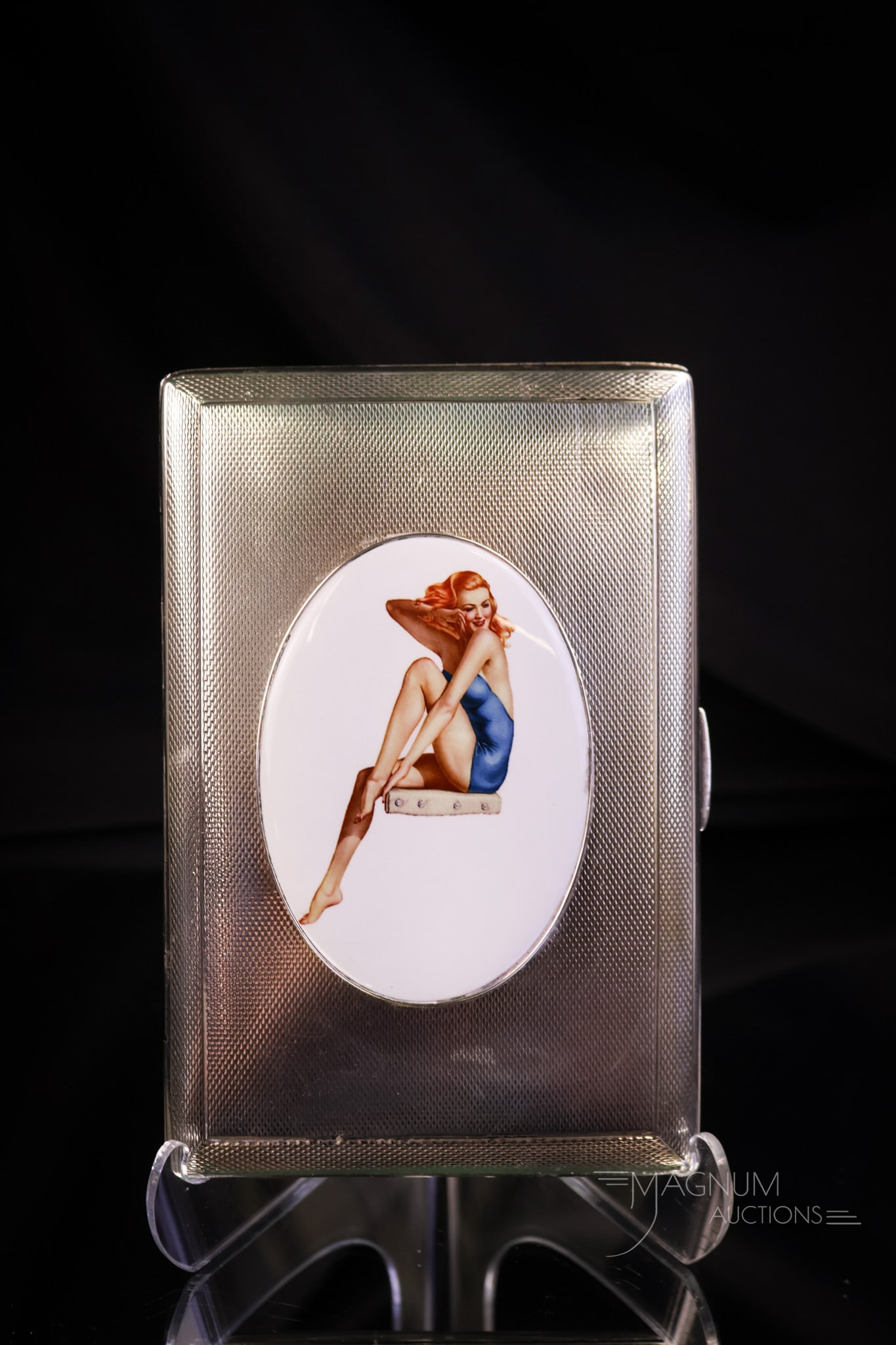 English Hallmarked Sterling Silver Art Deco Erotic Cigarette Case w/ Enameled Plaque: A beautiful English hallmarked sterling silver Art Deco erotic cigarette case. This piece features a scantily clad lady on an emaeled porcelain plaque. The interior is inscribed as a gift and dated 11