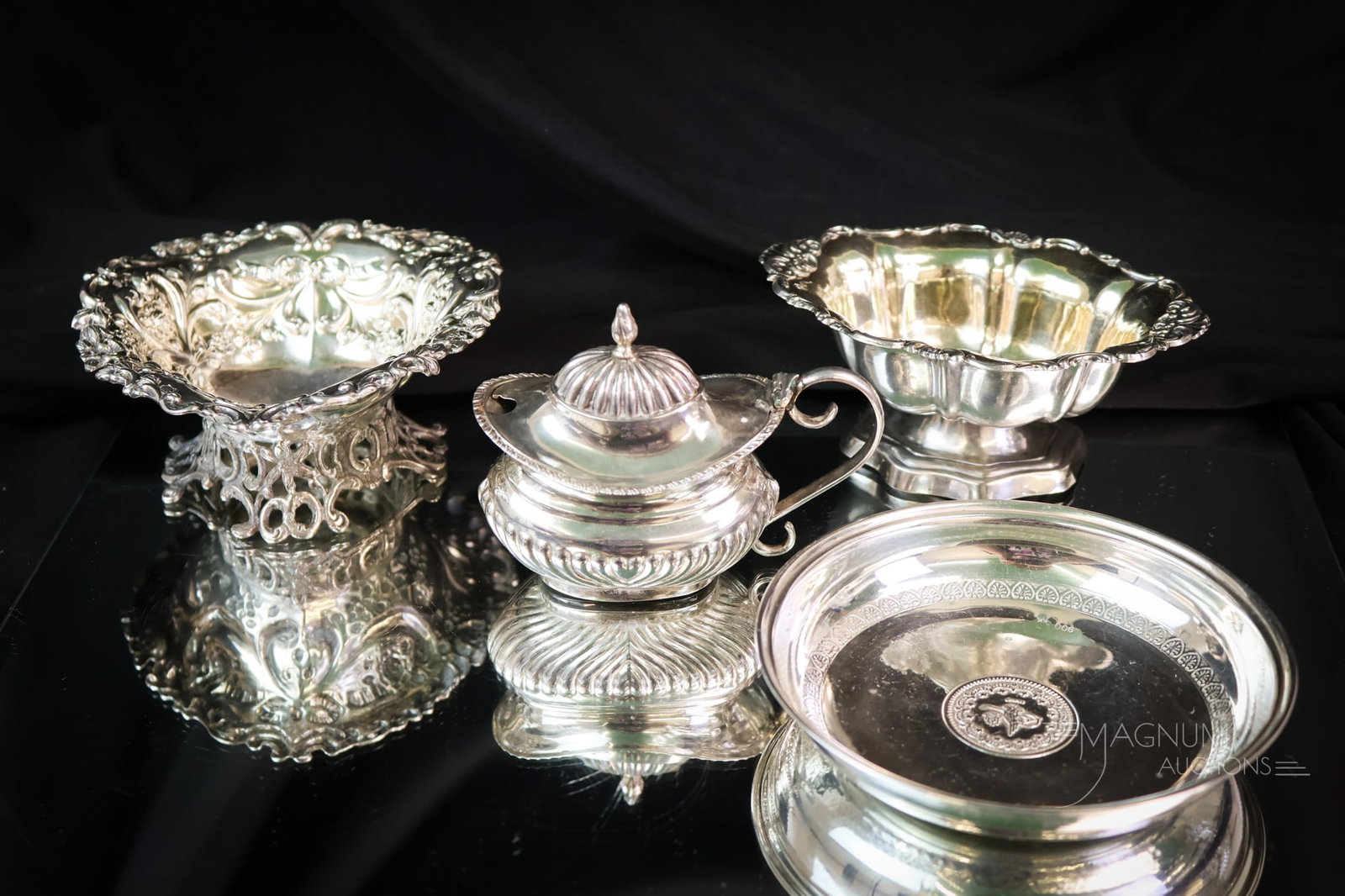 4 pc Lot English Hallmarked Sterling Silver: This lot includes a heart- shaped repousse little bowl. A small pedestal bowl. A lidded mustard pot. Lastly, there is a shallow bowl marked "900". The three sterling items weigh 6.833OZT. The marked "