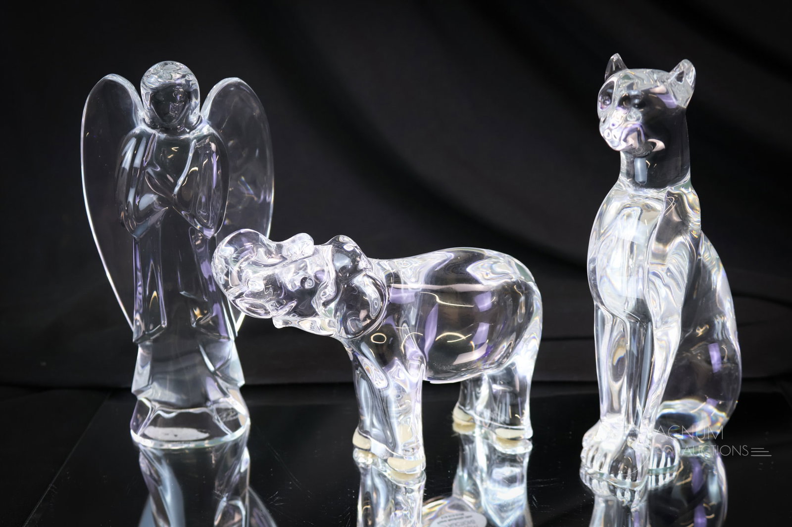 3 pc Lot Signed Baccarat Animal Figurines: There are three signed Baccarat animal figurines in this collectible lot. The lot includes a panther, an angel fish, and lastly, an elephant. The tallest measures 6". SHIPPING NOTICE: If you choose no