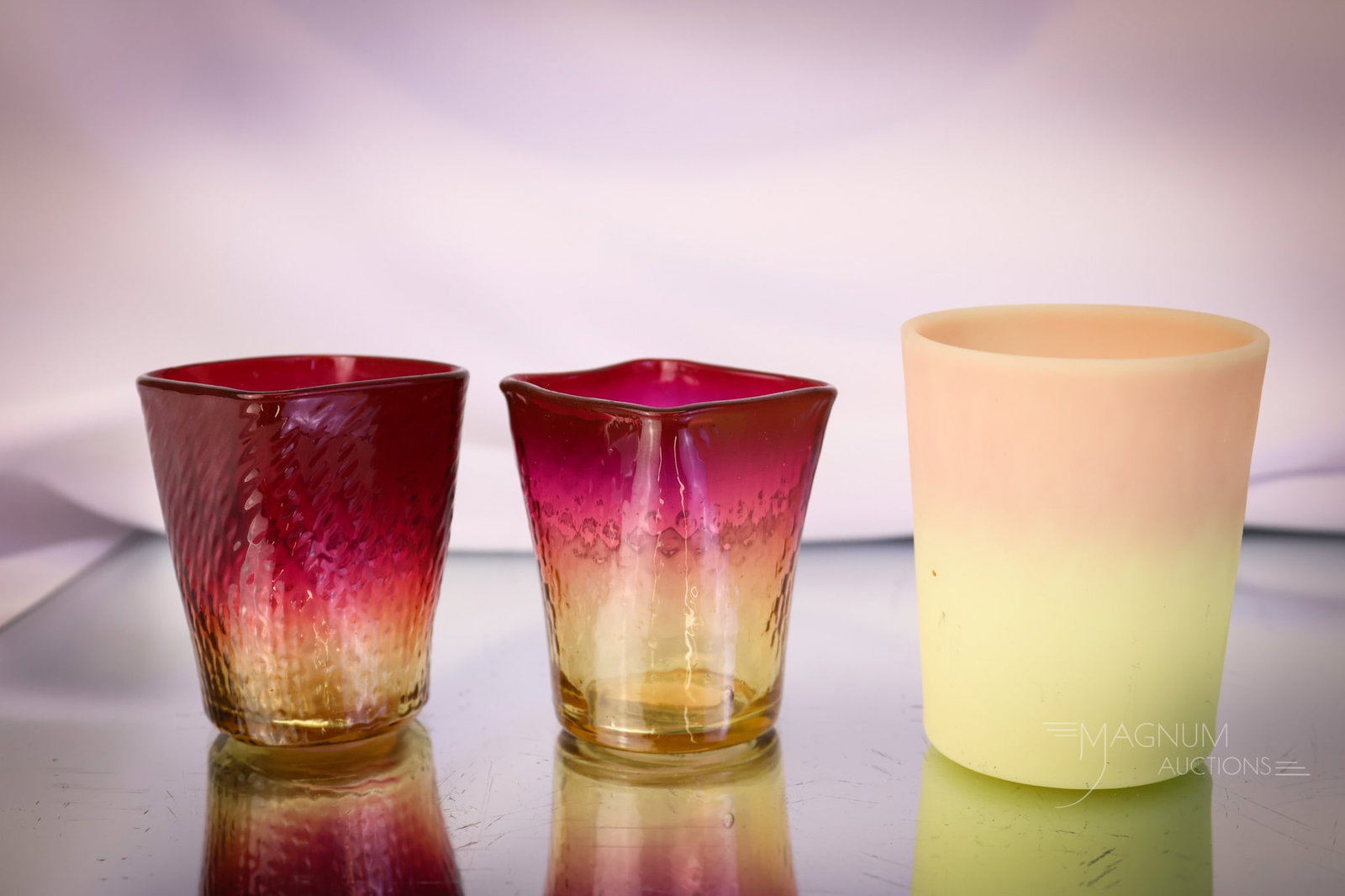 3 pc Lot Victorian Amberina & Burmese Glass Toothpick Holders & More: This lot combines two amberina glass diamond-quilted toothpick holders along with a burmese glass whiskey tumbler or toothpick. The tallest measures 2 3/4" tall. SHIPPING NOTICE: If you choose not to 