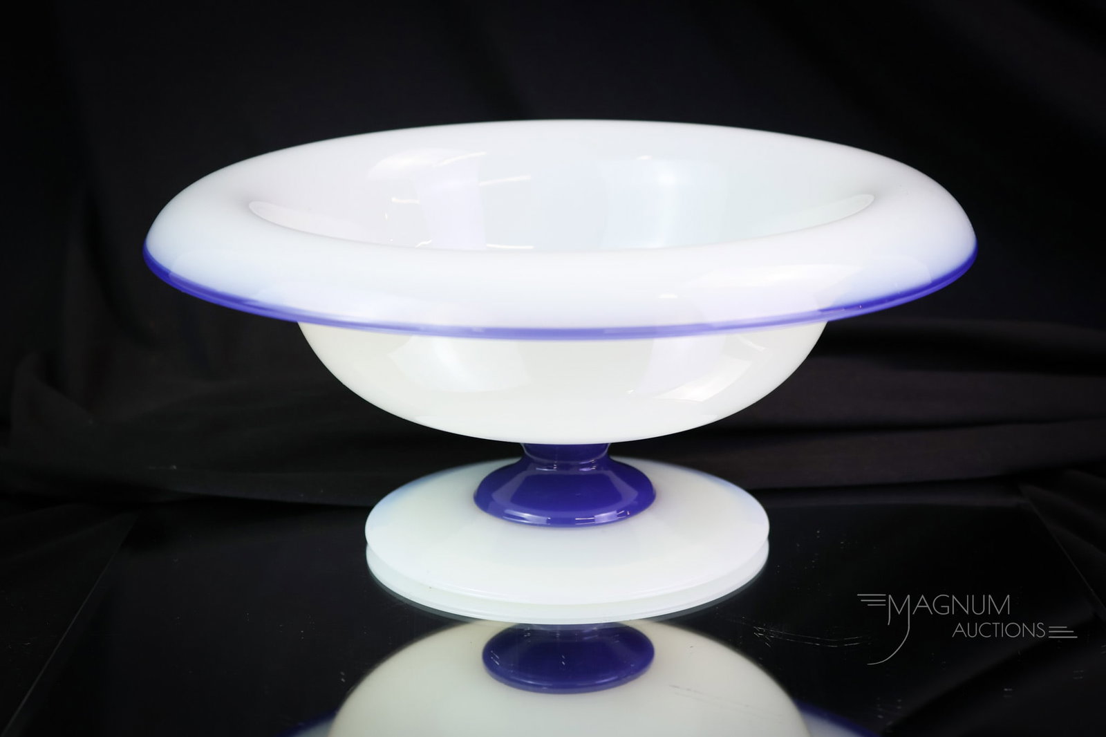 Fry Foval Delft Blue Glass Pedestal Center Bowl: A gorgeous find in Fry Foval Delft blue glass. This is a 10" center bowl. The bowl has a pedestal form. It measures 4 1/4" tall. SHIPPING NOTICE: If you choose not to utilize the LiveAuctioneers LiveS