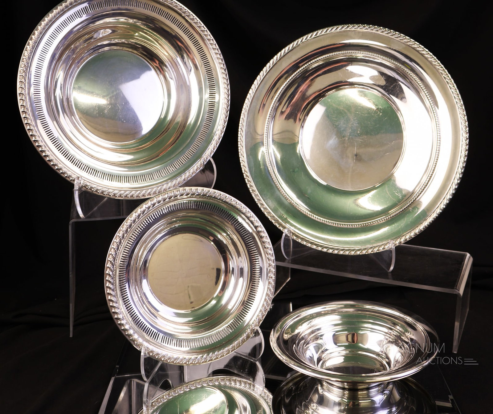4 pc Lot Antique Sterling Silver 16.766 OZT: A nice offering of four pieces of antique sterling silver. The lot weighs 16.766 OZT. The tallest piece is 1 3/4". The widest measures 9". WIRE TRANSFER OR CASH ONLY.