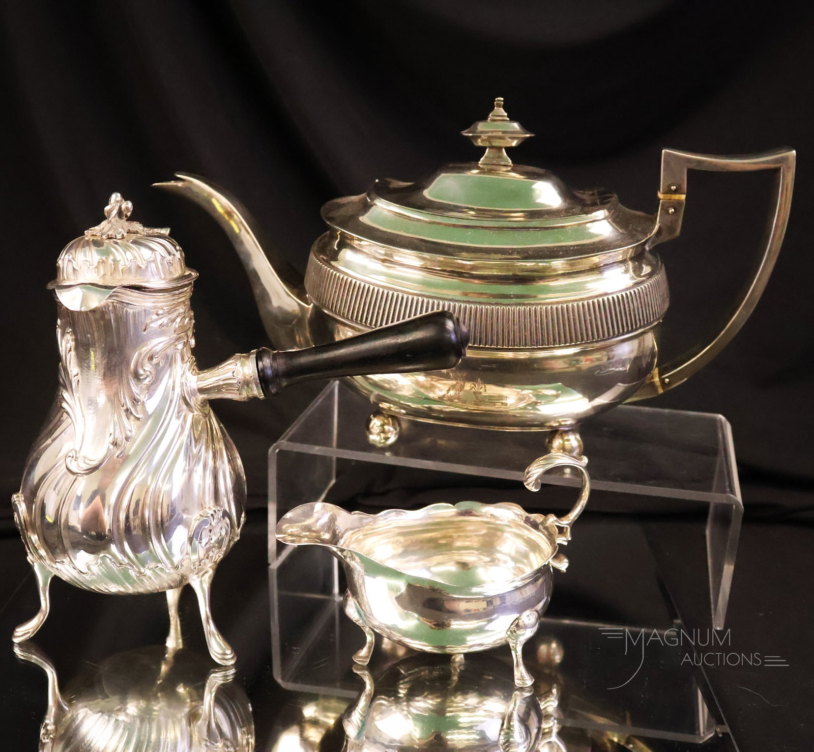 3 pc Lot Antique Sterling Silver 32.281 OZT: Three selections in antique sterling silver. This lot was weighed with the handles removed. The tallest measures 7 1/4". The widest is 11".WIRE TRANSFER OR CASH ONLY.