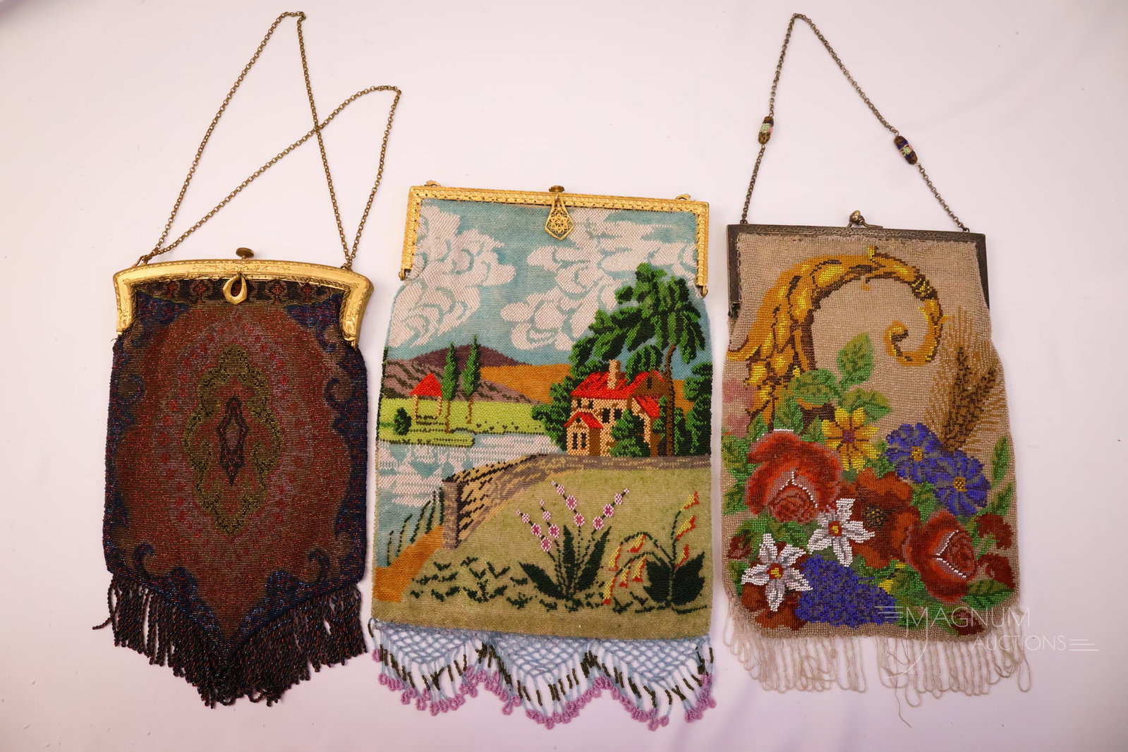 3 pc Lot Antique Beaded Purses French & More: A beautiful offering of three antique beaded purses. This lot includes a purse with a cornucopia decoration. A French micro-beaded purse with a gilt frame and double chain. Lastly, there is a