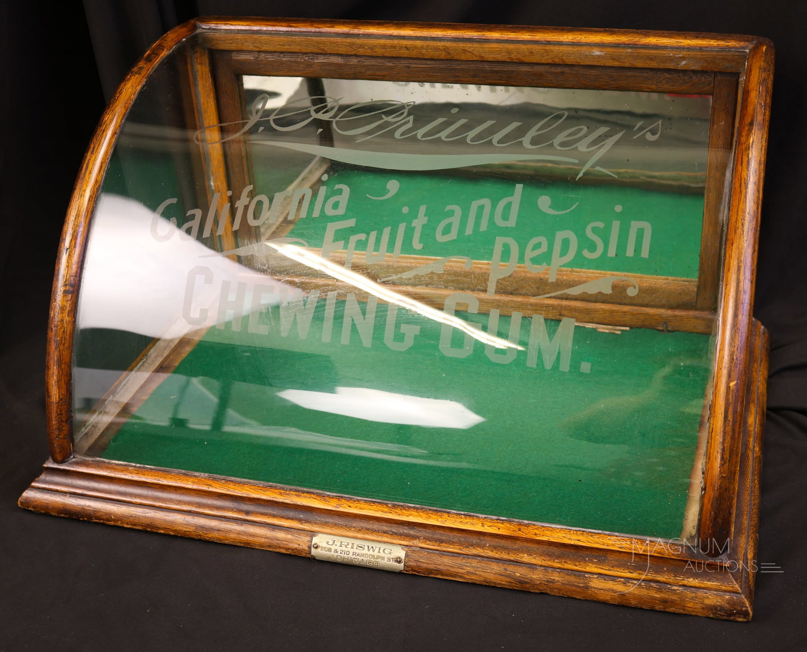 Antique J. P. Primley's California Fruit & Pepsin Chewing Gum Display Case: A beautiful and desirable find. This is a "J.P. Primley's California Fruit & Pepsin Chewing Gum" display case. The case frame is oak with original curved glass. The case retains the original brass