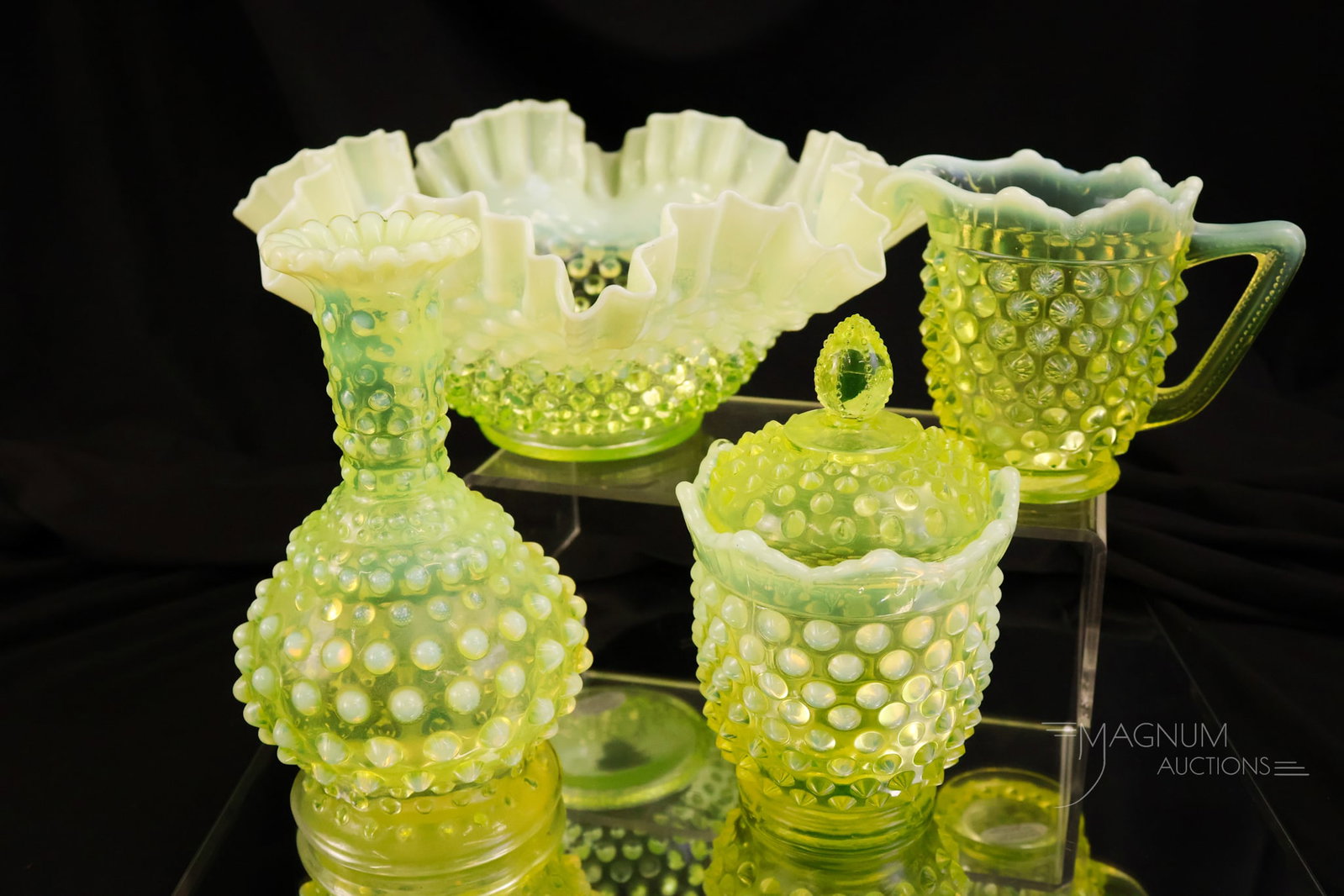 4 pc Lot Fenton Topaz Vaseline Opalescent Hobnail Glass Uranium: Four fine finds in Fenton Topaz vaseline opalescent hobnail pattern art glass. The offering is sure to please. The tallest measures 6 1/2" and the widest is 9 3/4".