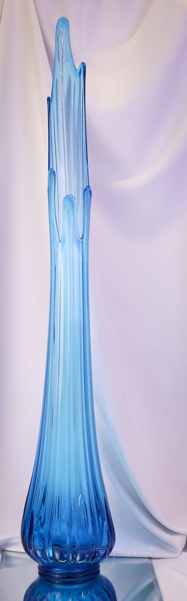 Monumental 46" L.E. Smith Ribbed Swung Vase: Fiot for the size queen, this vase is a rare find! The vase measures an astounding 46" tall and a girthy 8" in diameter at the widest portion. It is ribbed for pleasure and is sure to bring it to you 