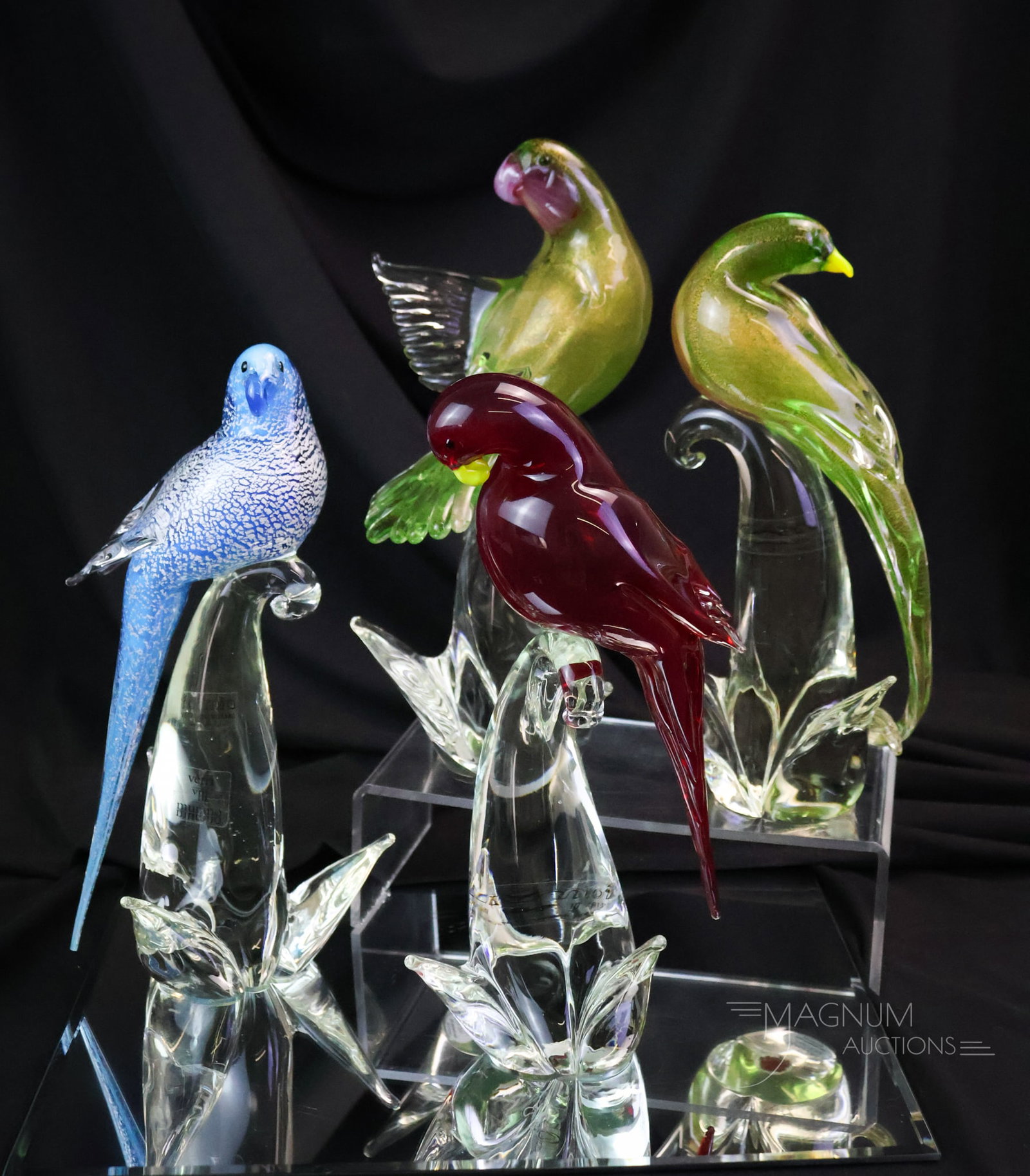 4 pc Lot Formia Vetri Di Italian Murano Art Glass Bird Sculptures: Four distinct finds in Formia Vetri Di Italian Murano art glass bird sculptures. There are two green speckled examples, one blue, and one ruby. The tallest measures 10".