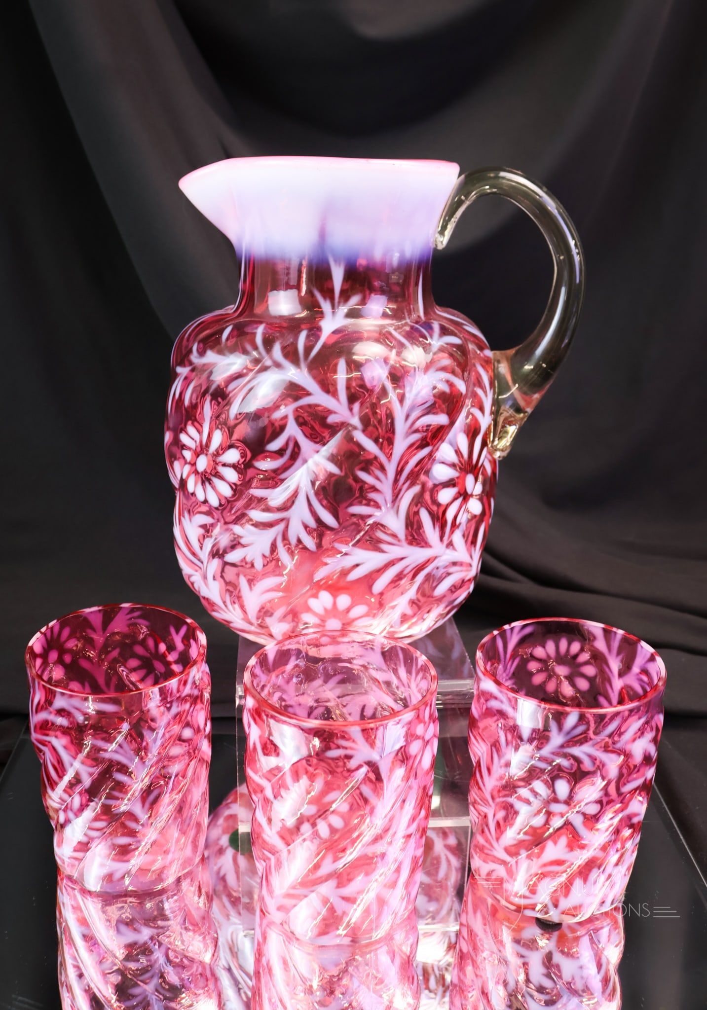 4 pc Northwood Daisy & Fern Parian Swirl Mold Water Set: A beautiful and rare find in Northwood opalescent glass. This is a cranberry opalescent Daisy & Fern in the Parian Swirl Mold water pitcher and three tumblers. The pitcher and tumblers are seldom