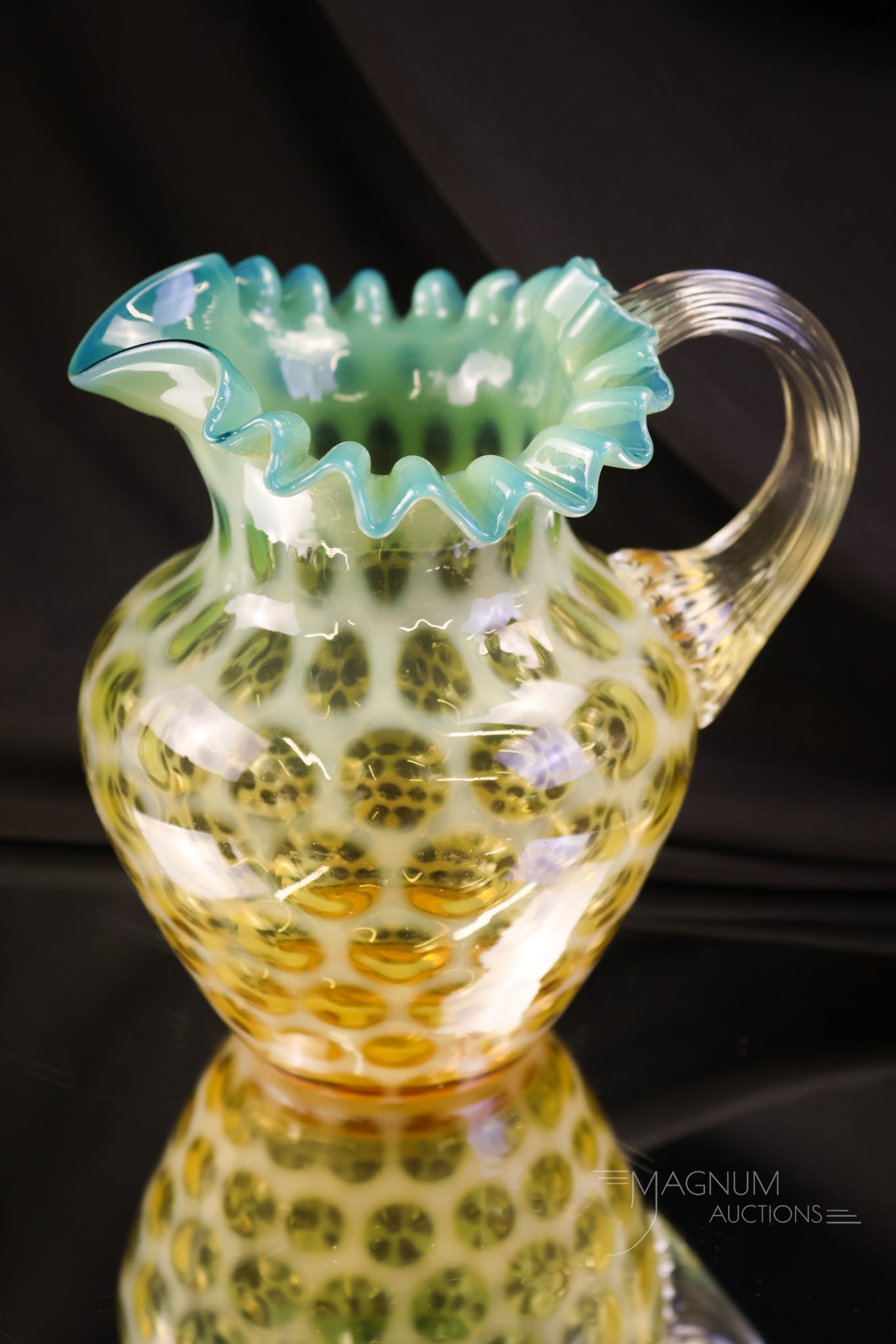 Rare Phoenix Amber Green Opalescent Honeycomb Victorian Glass Milk Pitcher: A beautiful and rare find in Phoenix Victorian opalescent glass. This is a milk pitcher in the Honeycomb pattern in amber to green glass. This piece measures 5 1/2" tall and 5 1/4" wide.