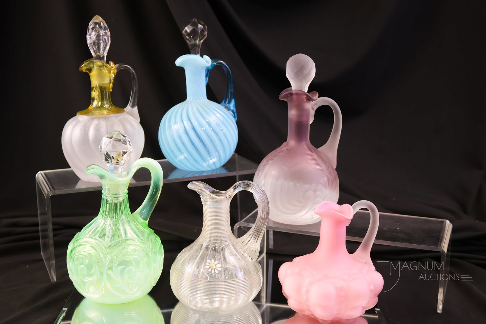 6 pc Lot Victorian Glass Cruets Hobbs Consolidated Northwood & More Uranium: A generous offering of six Victorian colored cruets for your collecting addiction. The lot includes a uranium-rich green Circle Scroll, along with others by notable makers such as Northwood, Hobbs, an