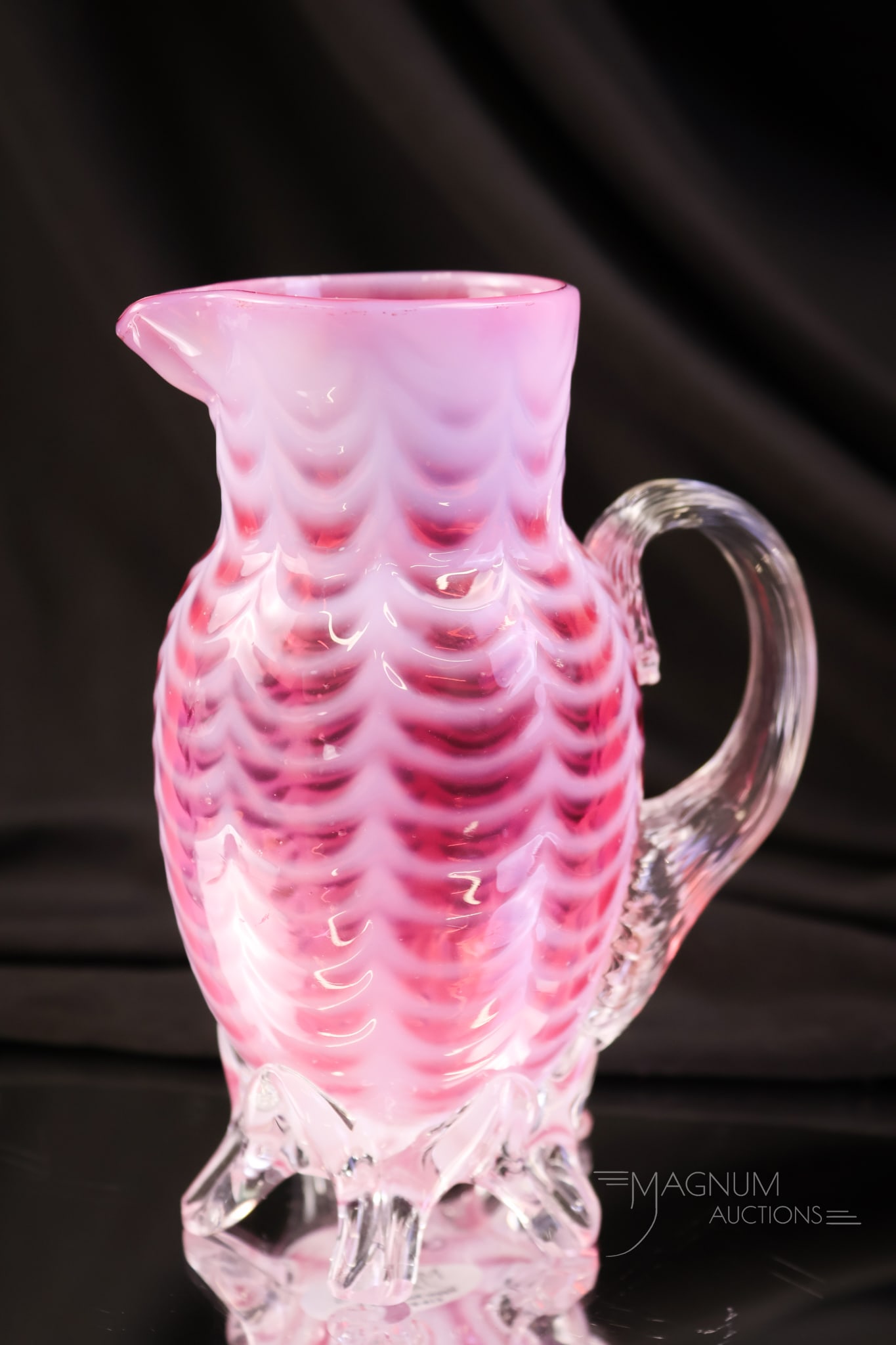 Rare Phoenix Cranberry Opalescent Drape Footed Cream Pitcher: A beautiful, delicate, and rare find in Victorian Phoenix cranberry opalescent glass. This is a footed cream pitcher in a drape pattern. This piece has lovely color and rich, heavy opal. The creamer m