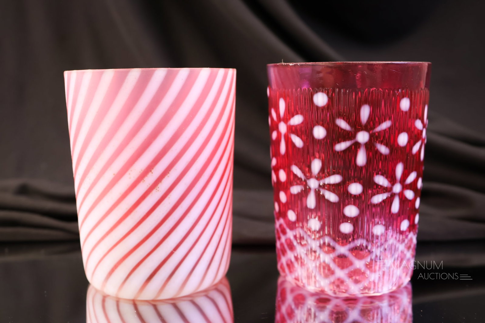 2 pc Lot Victorian Cranberry Opalescent Glass Tumblers Northwood & More: Two excellent finds in Victorian cranberry opalescent glass tumblers. The first is a Northwood Ribbed Christmas Snowflake pattern tumbler. The second is a satin example in the Swirl pattern. The talle