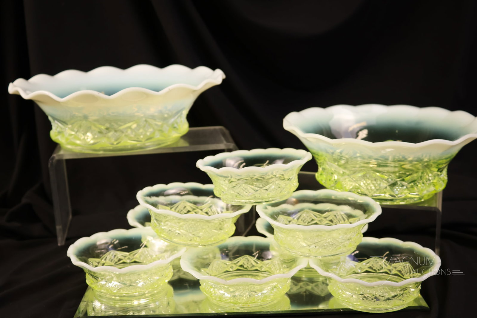10 pc Lot Northwood National Vaseline Opalescent Diamond Spearhead Bowls: A glowing lot of ten Victorian Northwood/National vaseline opalesent uranium-rich Diamond Spearhead pattern bowls. The lot includes a 9 1/4" bowl, a 7 3/4" bowl, and eight individual berry bowls. The 