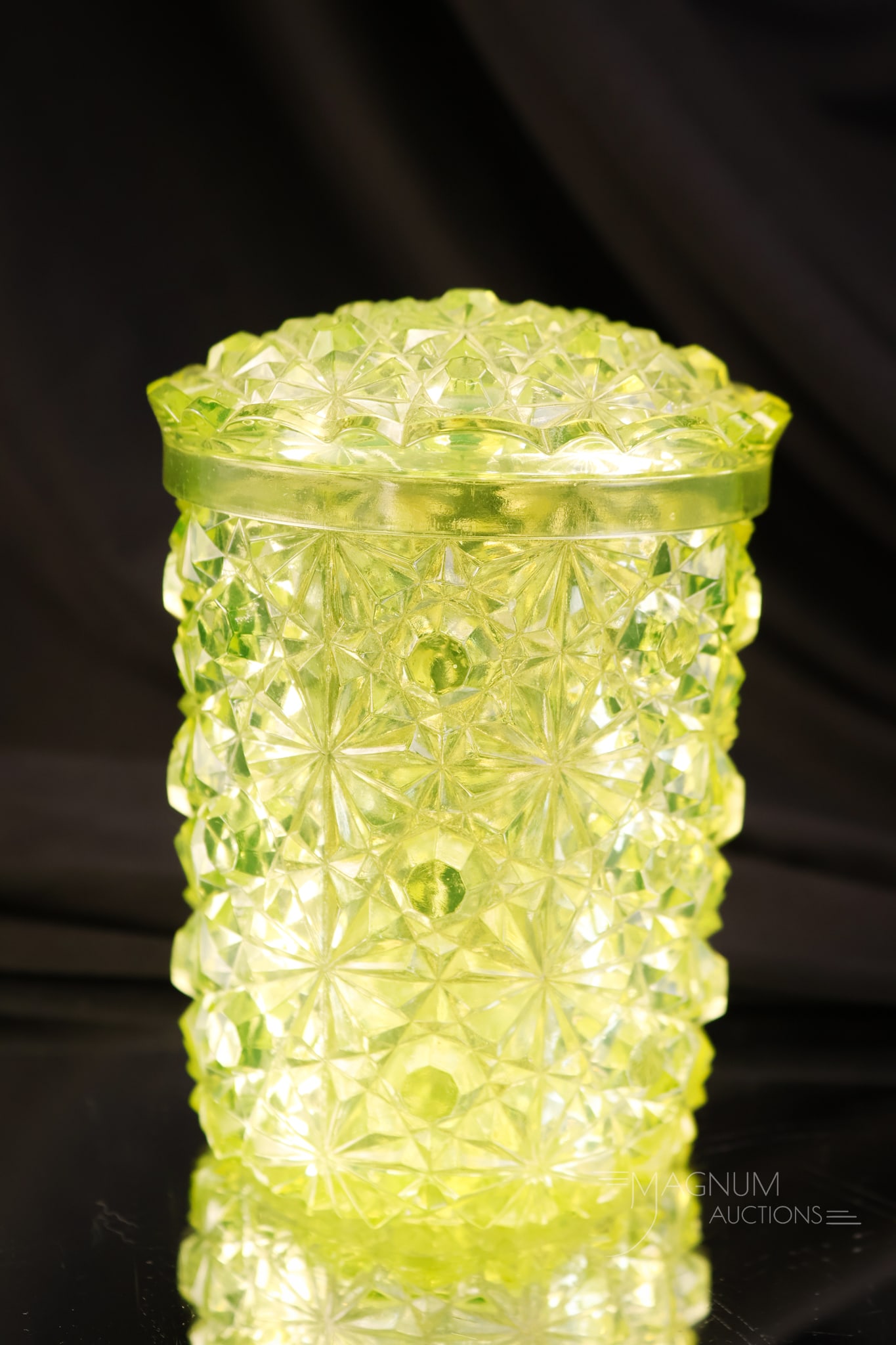 Scarce Vaseline Daisy & Button Lidded Glass Victorian Pickle Jar: Another scarce find in our auction. This covered pickle jar is in uranium-rich vaseline glass in the Daisy & Button pattern. Not many of these around with the original lid, we dare say. This one measu