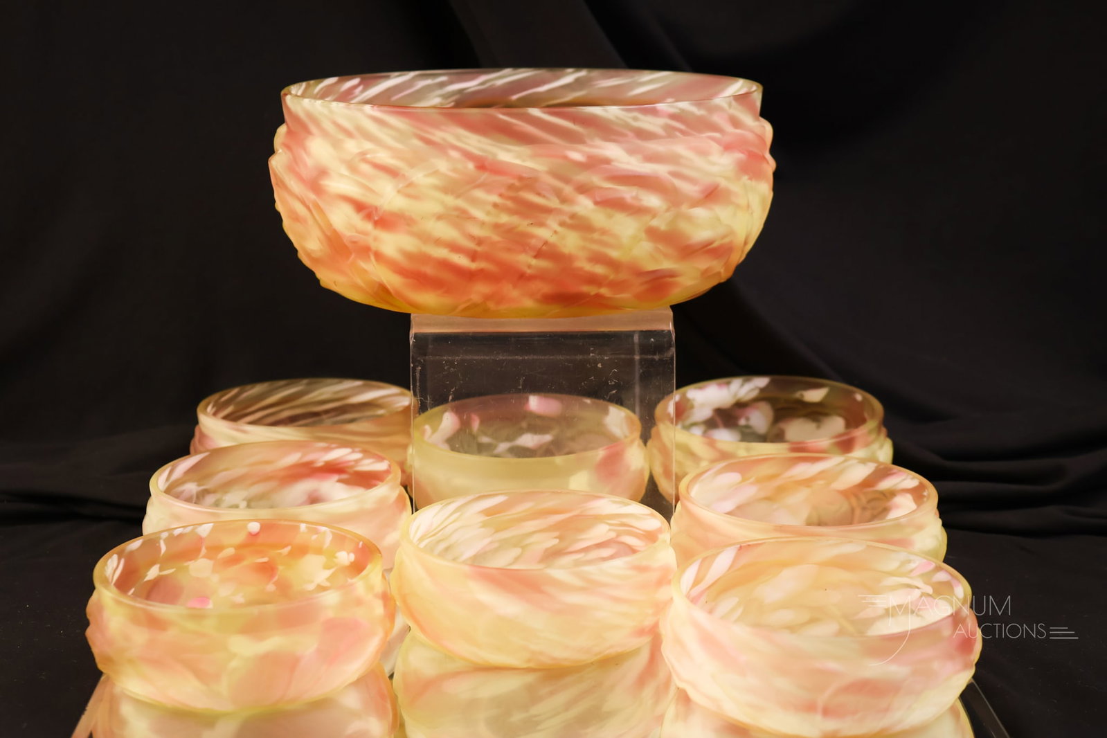 Northwood Leaf Mold Vaseline Cranberry Uranium Spatter Victorian Glass Berry Set: A Northwood Leaf Mold vaseline cranberry satin berry set with a rich satin finish. This set is rich in uranium content and glows brightly under black light. The tallest of the set measures 3 1/4".