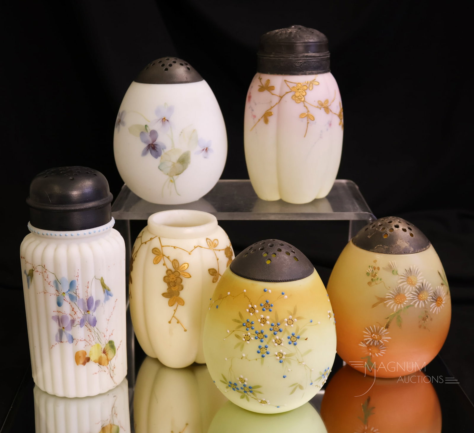 6 pc Lot Mt. Washington Smith Bros.Victorian Glass Sugar Shakers Muffineers: Six gems for your collection that you won't want to miss out on! This lot offers Mt. Washington and Smith bros. examples of table accoutrements of a bygone era. The tallest measures 5 3/4". One shaker