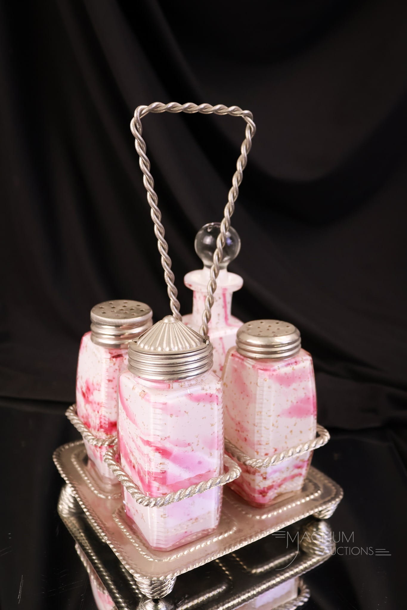Rare Northwood Royal SilverVictorian Glass Zippered Corner Condiment Castor: A rare find in Victorian Northwood Glass. This is a Royal Silver cased cranberry mica spatter four-piece condiment set in the Zippered Corner pattern. This set includes a mustard, a pair of shakers, a