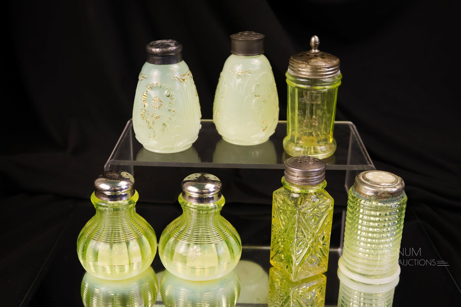7 pc Lot Vaseline Uranium Victorian Glass Salt Shakers Northwood Albany & More: A Vasie lovin' lot for your bidding pleasure! This lot offers uranium-rich vaseline glass shakers by Northwood, Albany, and more. There is a rare Ribbed Spiral in the lot! The tallest measures 3 1/4".