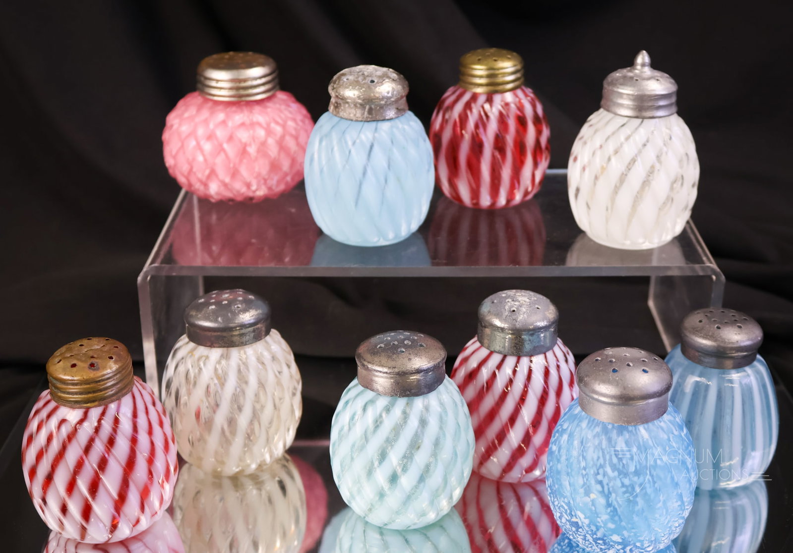 10 pc Lot Opalescent Victorian Glass Reverse Swirl & More Salt Shakers: Ten fine examples of Victorian opalescent and more salt shakers. Eight are in the Reverse Swirl pattern. This lot includes several pairs and some singles. The tallest measures 2".