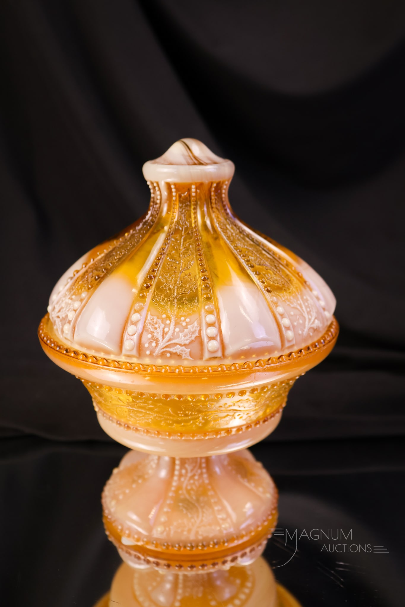 Greentown Holly Amber Victorian Glass Small Covered Compote: This item is listed again due to a non-paying and now blocked bidder. This little lidded compote in Greentown Victorian Holly Amber glass measures 6" tall and 4 3/4" wide. The base exhibits a single c