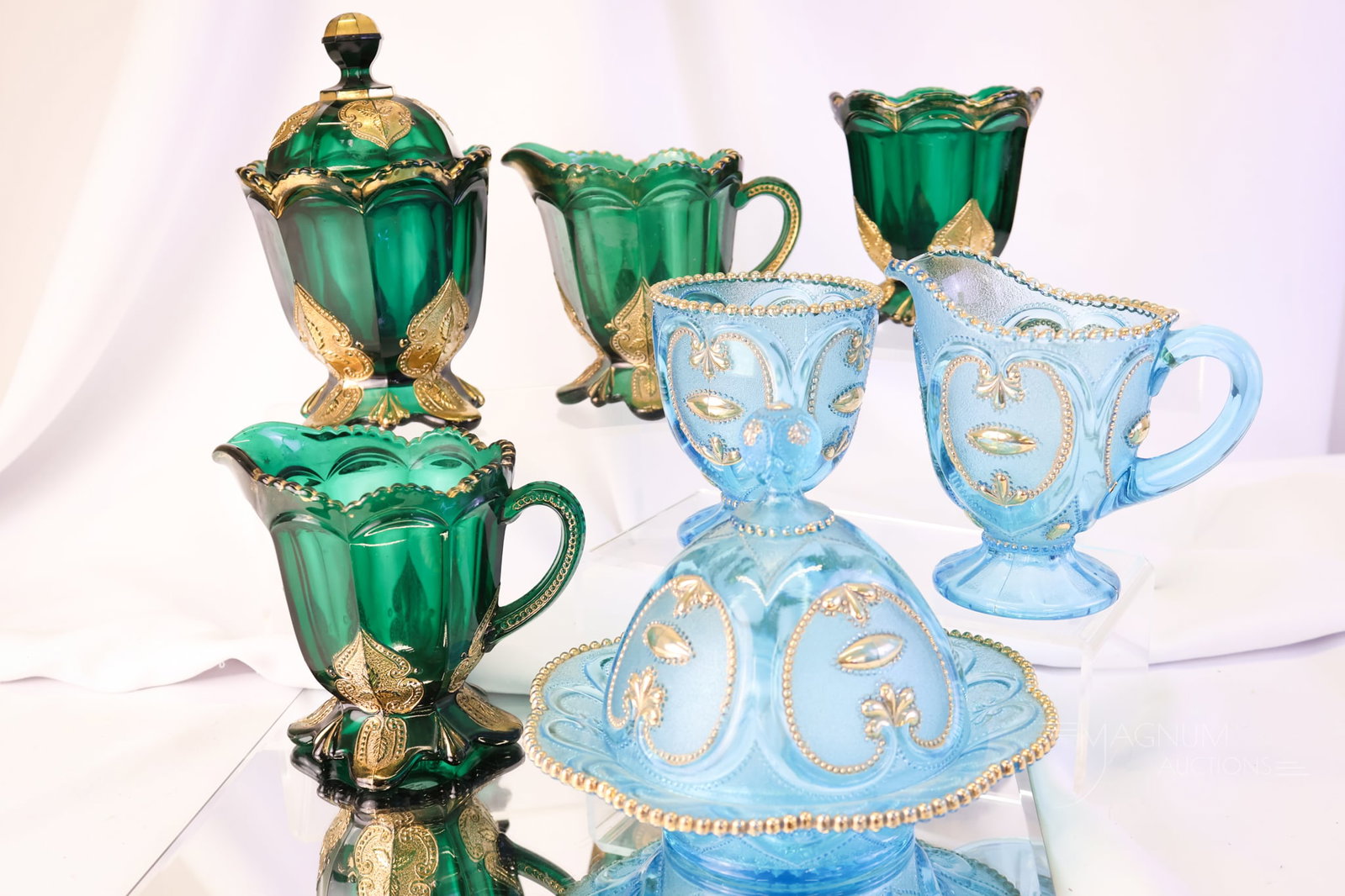 7 pc Lot EAPG Northwood Dugan Victorian Glass Table Articles: Seven unique finds in Victorian Dugan and Northwood Glass. Various forms and patterns to delight. The tallest measures 7 1/4".