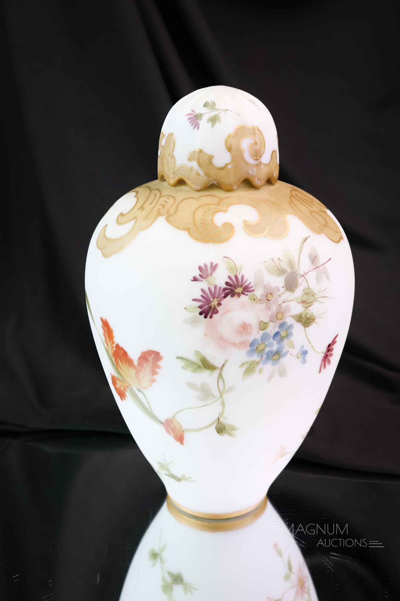 Mt. Washington Signed Crown Milano Victorian Glass Temple Jar: A fine example of the beautiful wares Mt. Washington Glass Co. made in the Victorian era. This piece features a Dresden Floral decoration. The temple jar measures 9" tall and 5 1/2" wide. The lid exhi