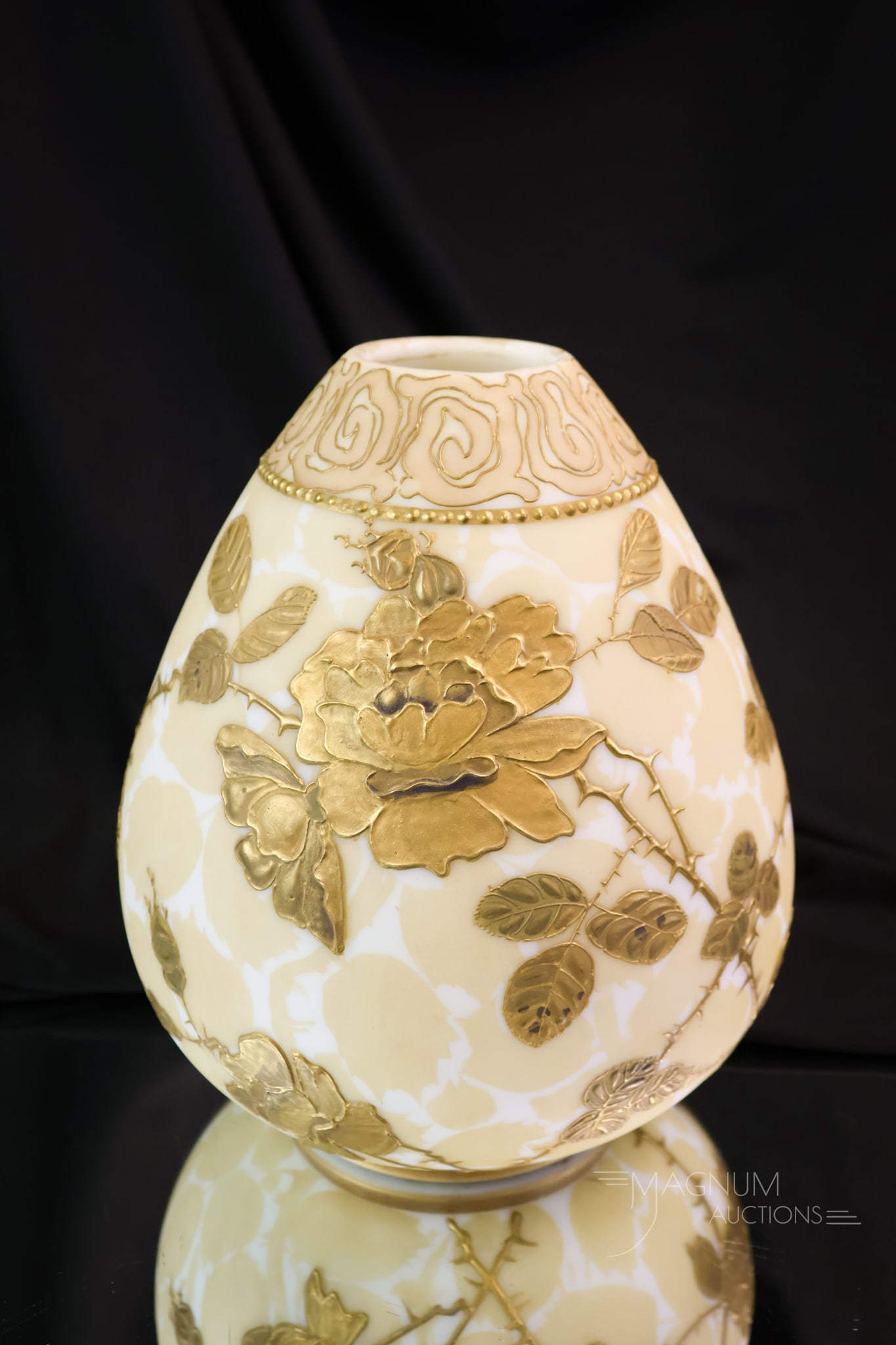 Mt. Washington Crown Milano Victorian Glass Vase: A Mt. Washington Art Glass vase with heavy built-up decoration of florals. This outstanding find measures 8" tall and 6 1/2" wide.