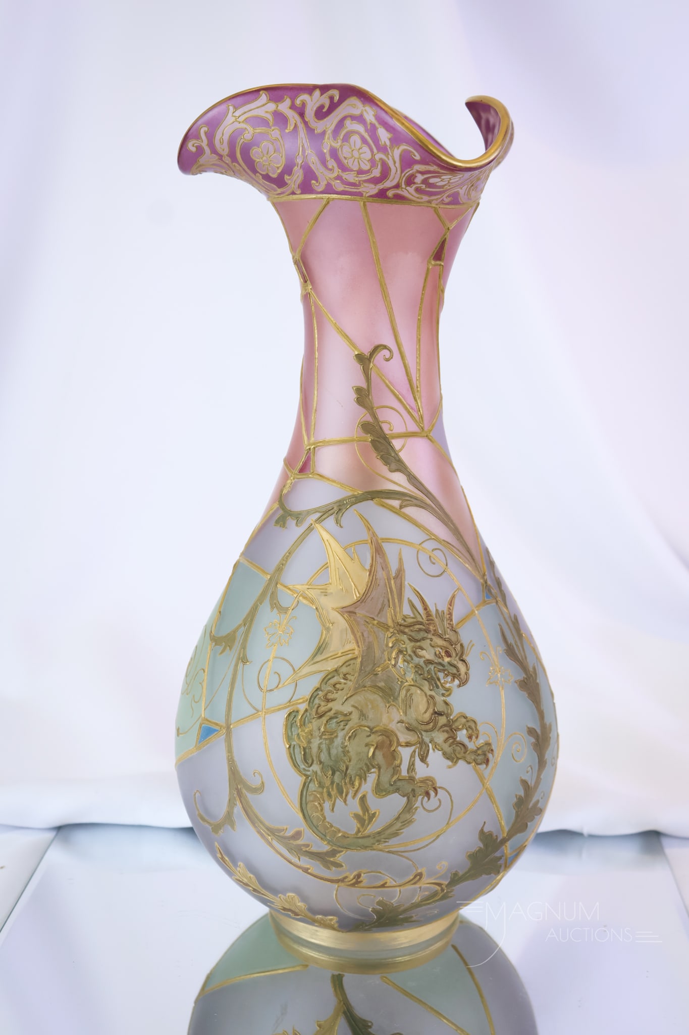 Mt. Washington Royal Flemish Glass Griffin Dragon 13 3/4" Vase: An exciting find in Mt. Washington art glass. This is a Royal Flemish line Griffin and Dragon-decorated 13 3/4" vase. This vase has colorful segmented panels. A super example.