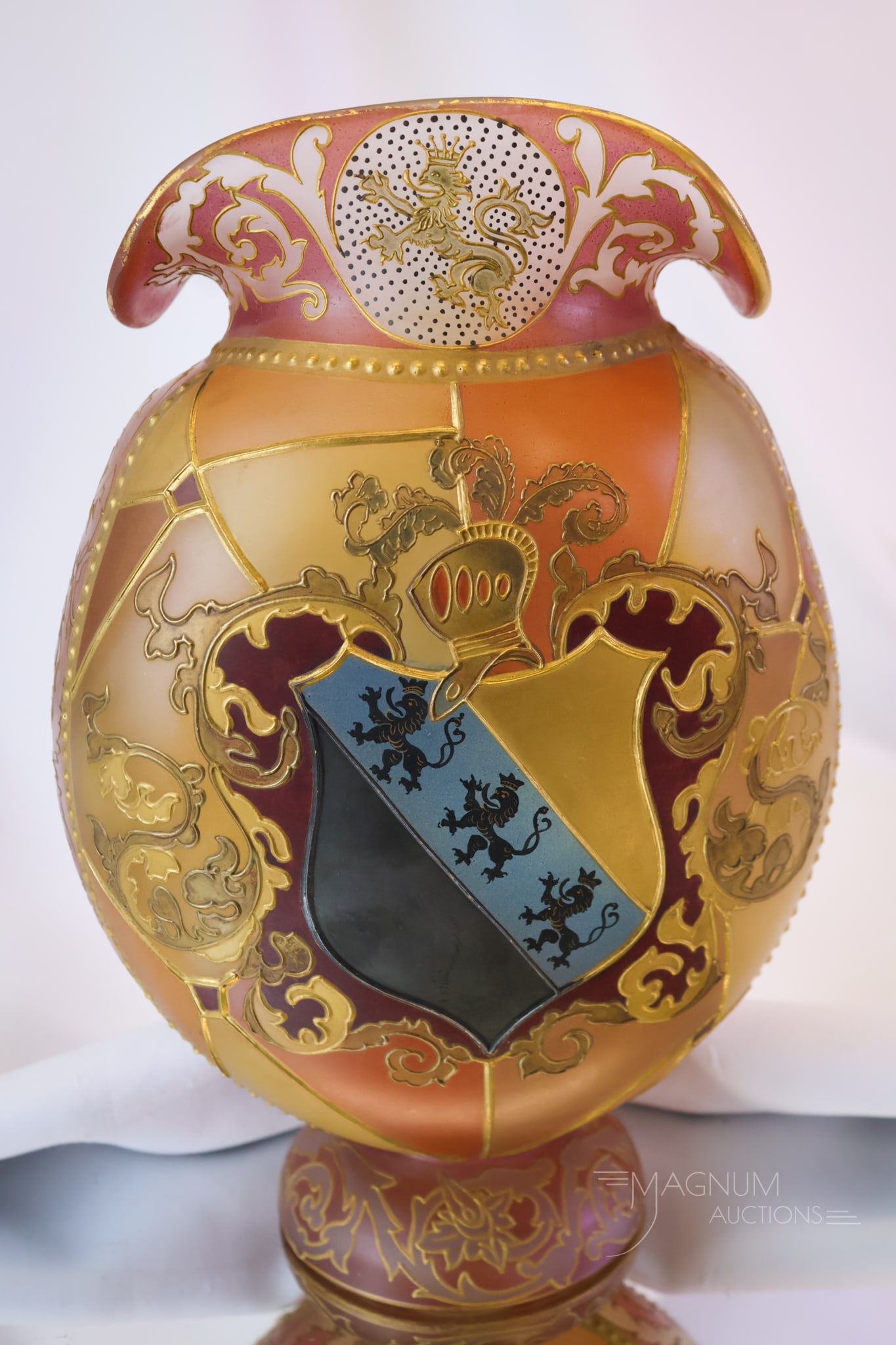 Rare Mt. Washington Royal Flemish Victorian Glass Griffin Shield Vase: A gorgeous and rare find in Mt. Washington Glass Royal Flemish. This vase is ovoid in form and features segmented panels. It is accented by heraldic crest shields and griffins on the rim. The vase mea